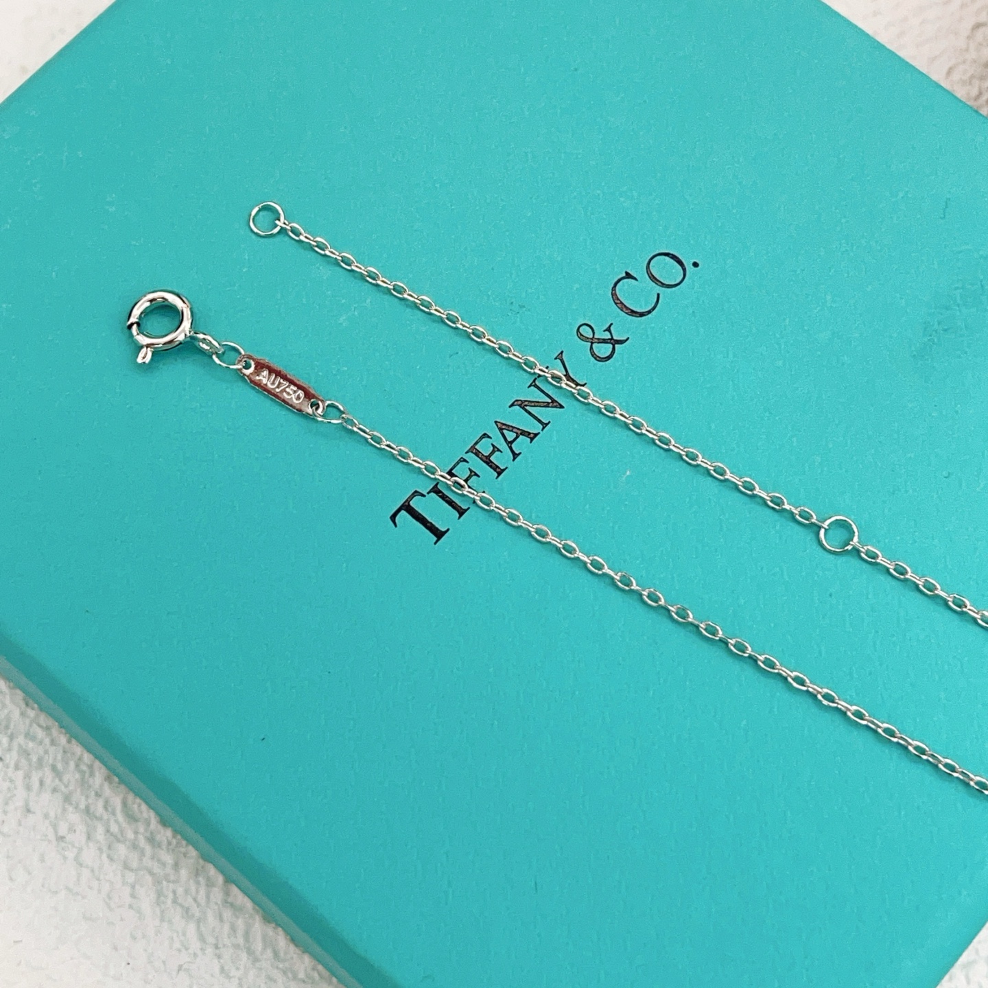 Tiffany Co Tiffany Keys Victoria Key Pendant necklace sterling silver with clear diamond-like gemstones 18 inch adjustable chain