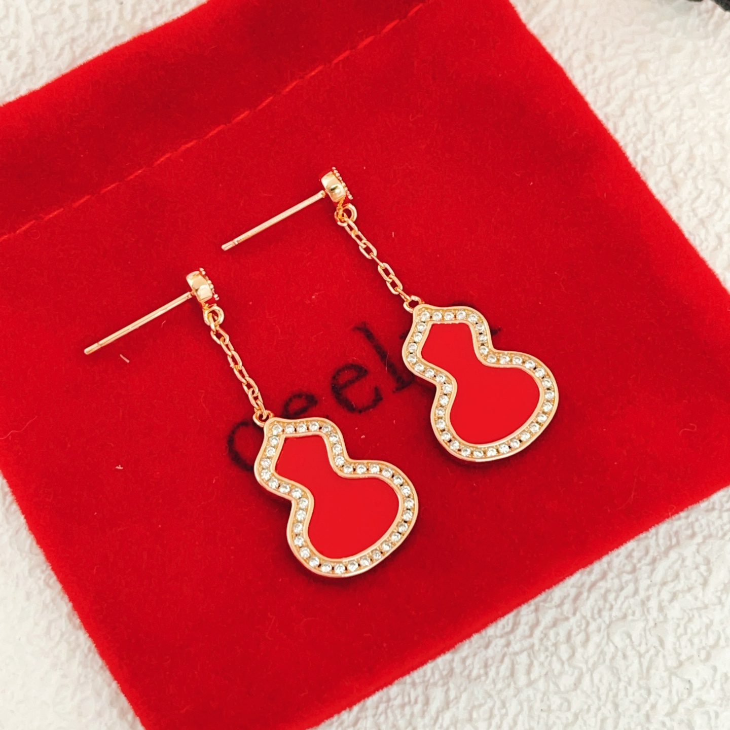 Qeelin Wulu earrings 18k rose gold red carnelian clear diamond 3 5cm drop length