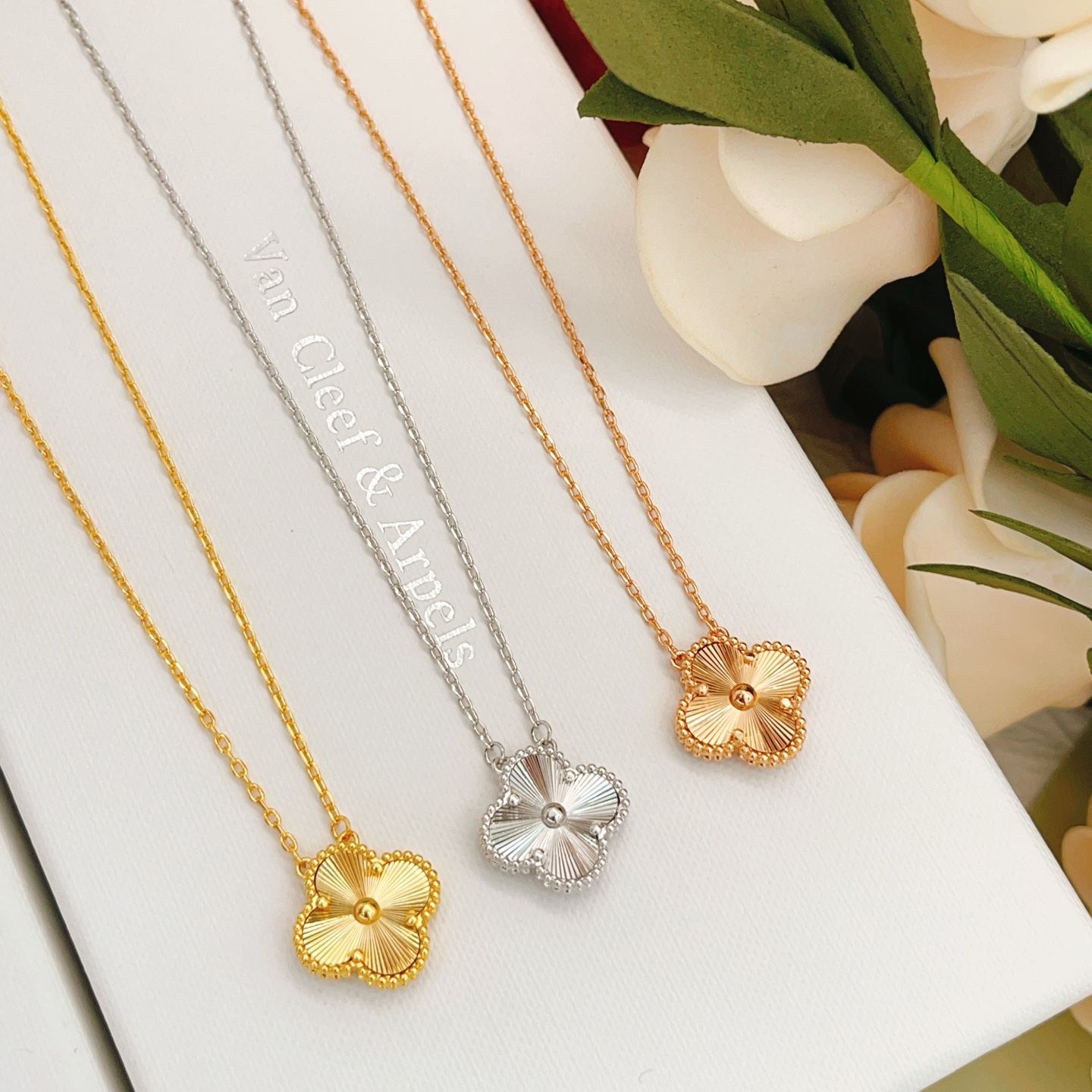 Van Cleef Arpels Alhambra necklace silver white gold with guilloche silver clover pendant 42cm