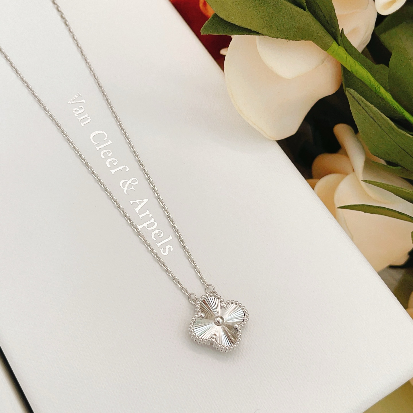 Van Cleef Arpels Alhambra necklace silver white gold with guilloche silver clover pendant 42cm