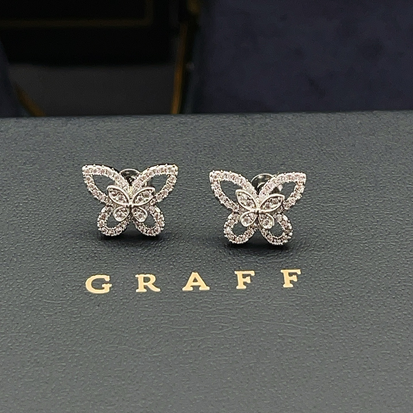 Graff Butterfly Silhouette earrings white gold with pave white diamonds 10mm stud diameter