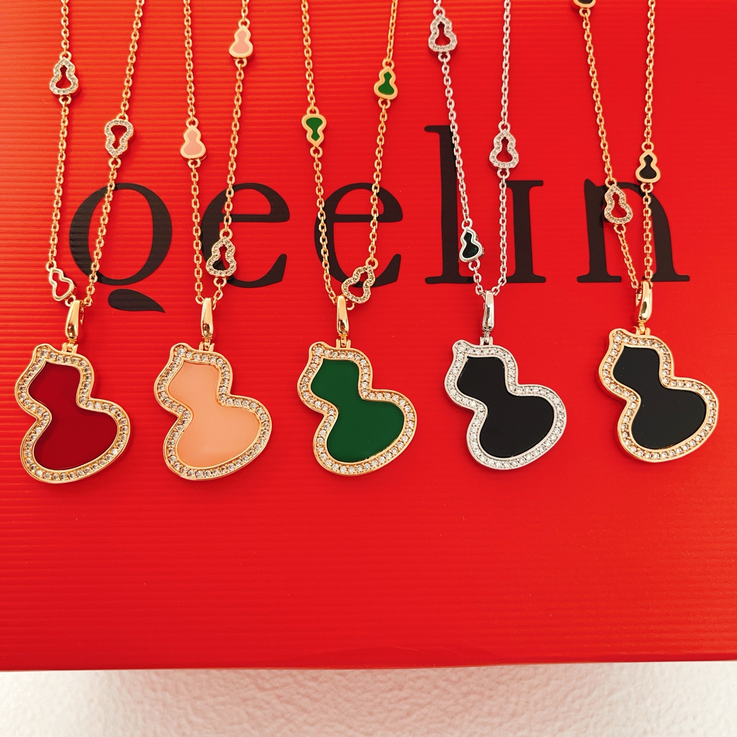Qeelin Wulu necklace rose gold red carnelian clear diamond 42cm