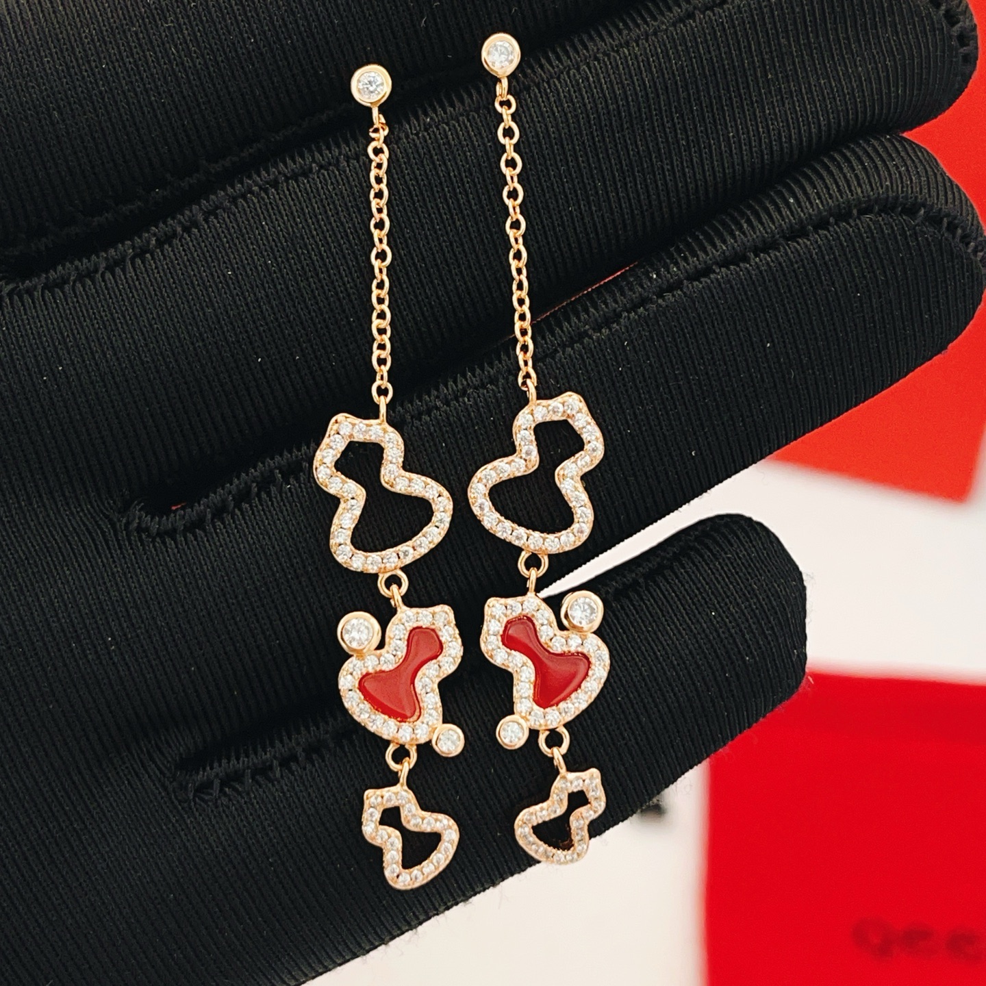 Qeelin Wulu earrings rose gold metal red carnelian inlay clear diamond accents 4 5cm drop length