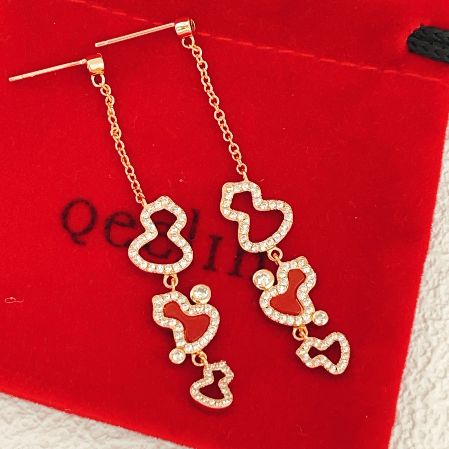 Qeelin Wulu earrings rose gold metal red carnelian inlay clear diamond accents 4 5cm drop length