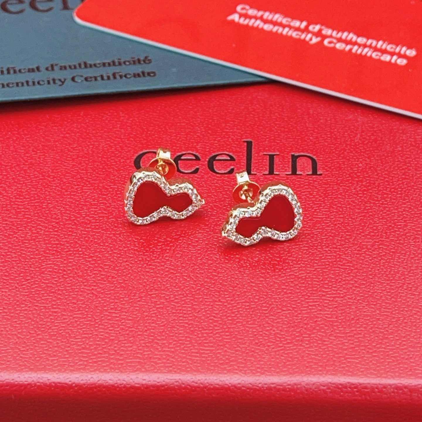 Qeelin Wulu earrings 18k rose gold red carnelian clear diamond pave 8mm stud length