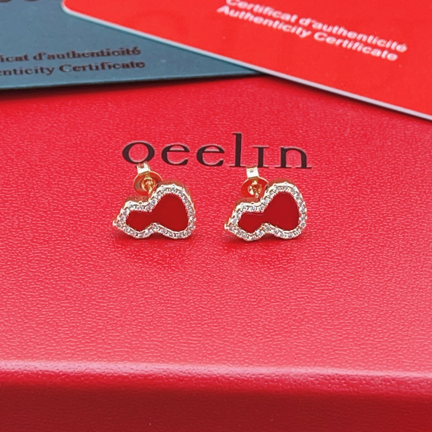 Qeelin Wulu earrings rose gold red carnelian clear diamond 8mm stud length