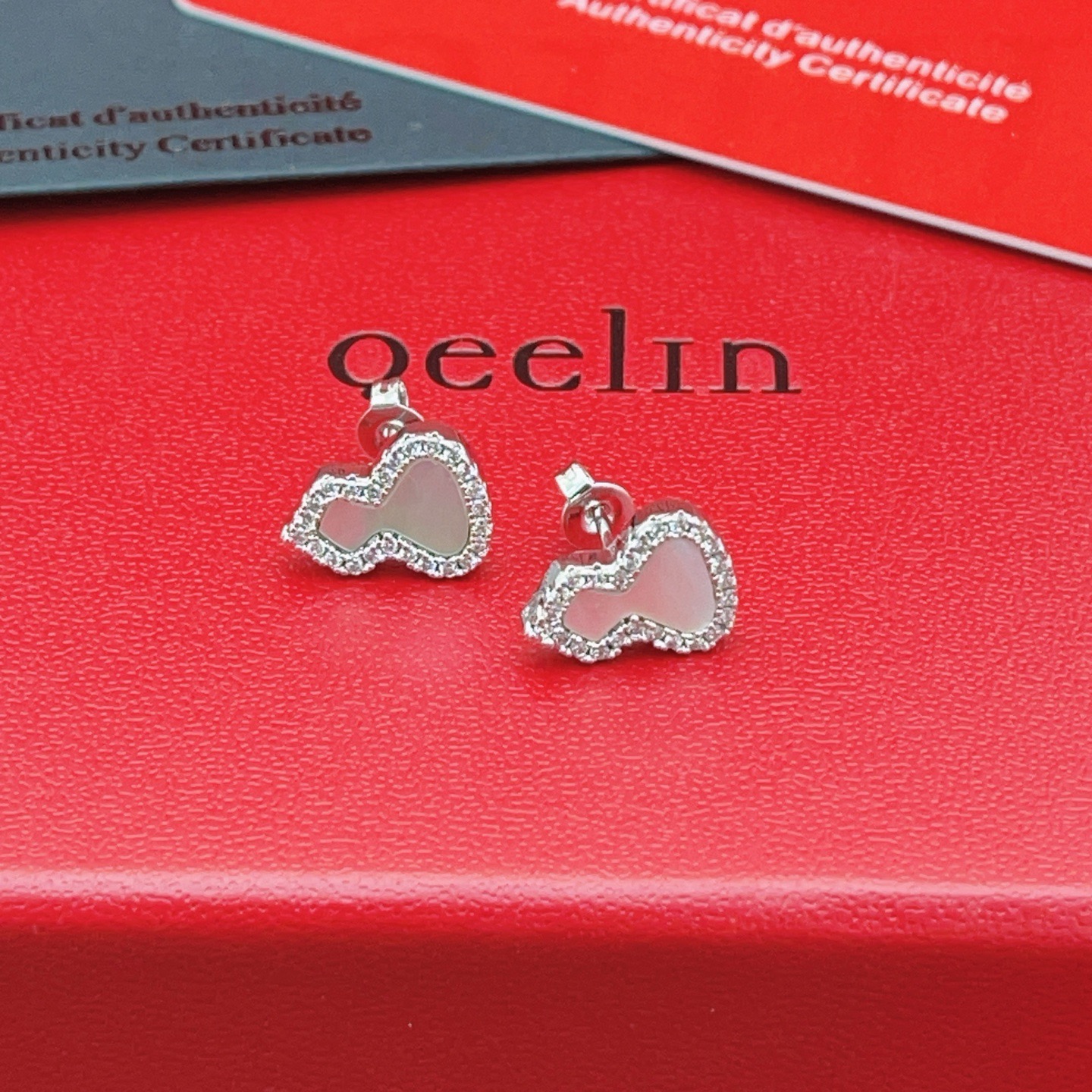 Qeelin Wulu earrings silver-toned white gold white mother-of-pearl clear diamond accents 8mm stud length