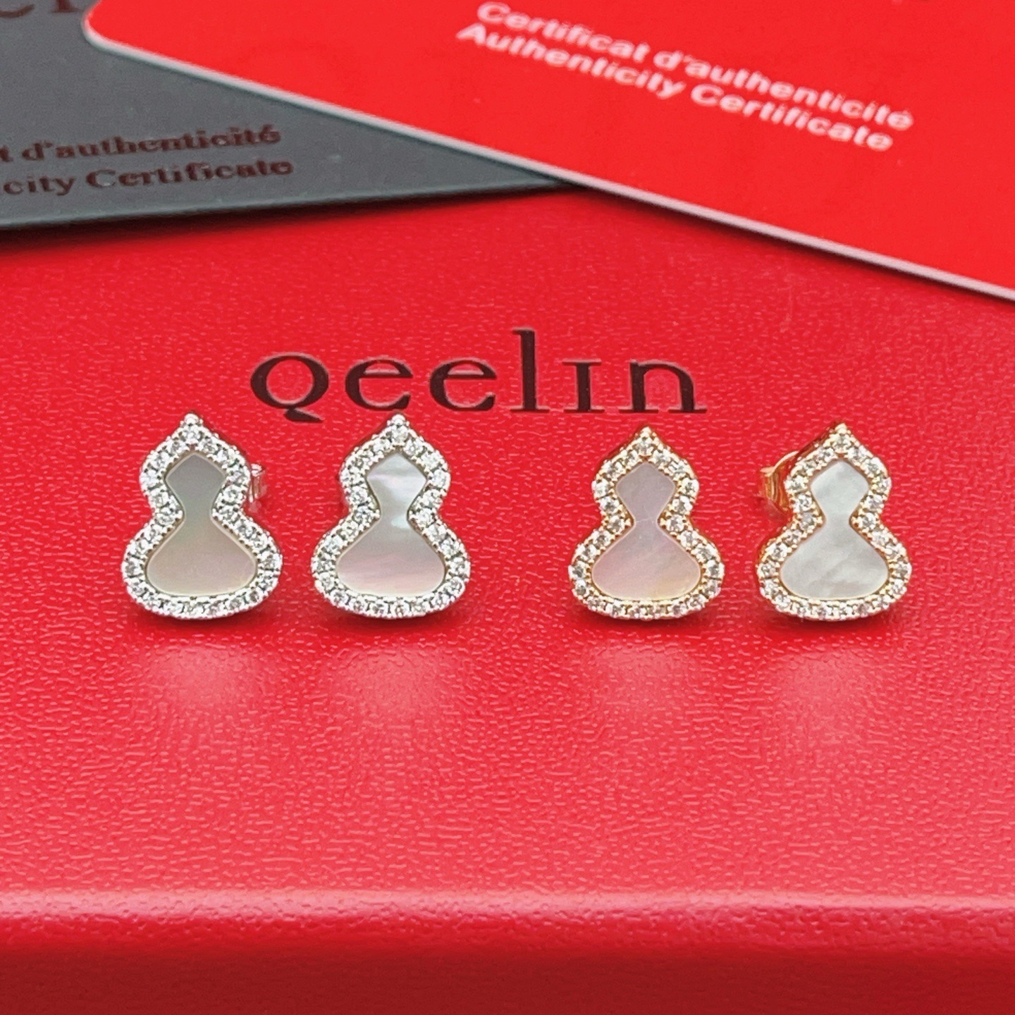 Qeelin Wulu earrings silver-toned white gold white mother-of-pearl clear diamond accents 8mm stud length