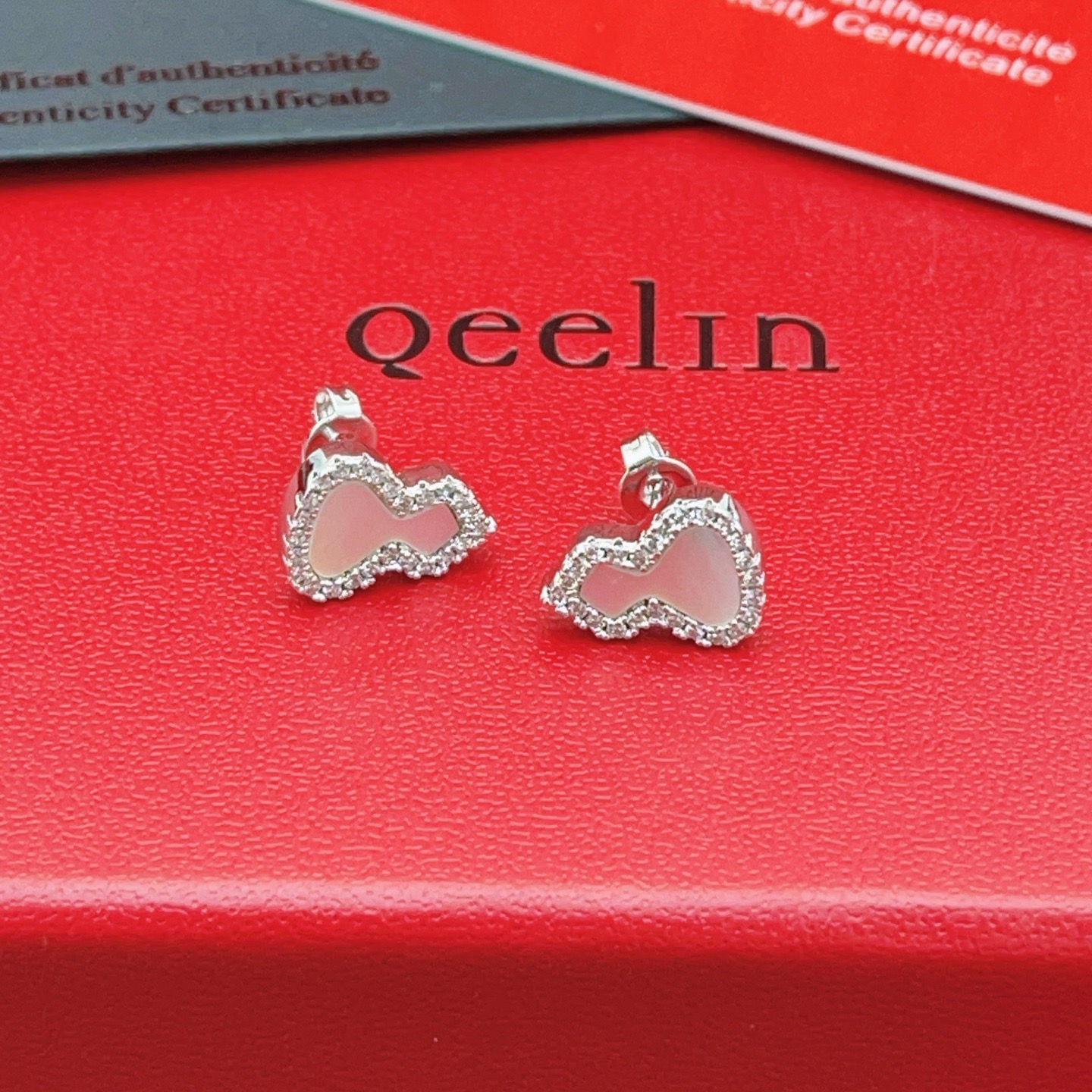 Qeelin Wulu earrings silver-toned white gold white mother-of-pearl clear diamond accents 8mm stud length