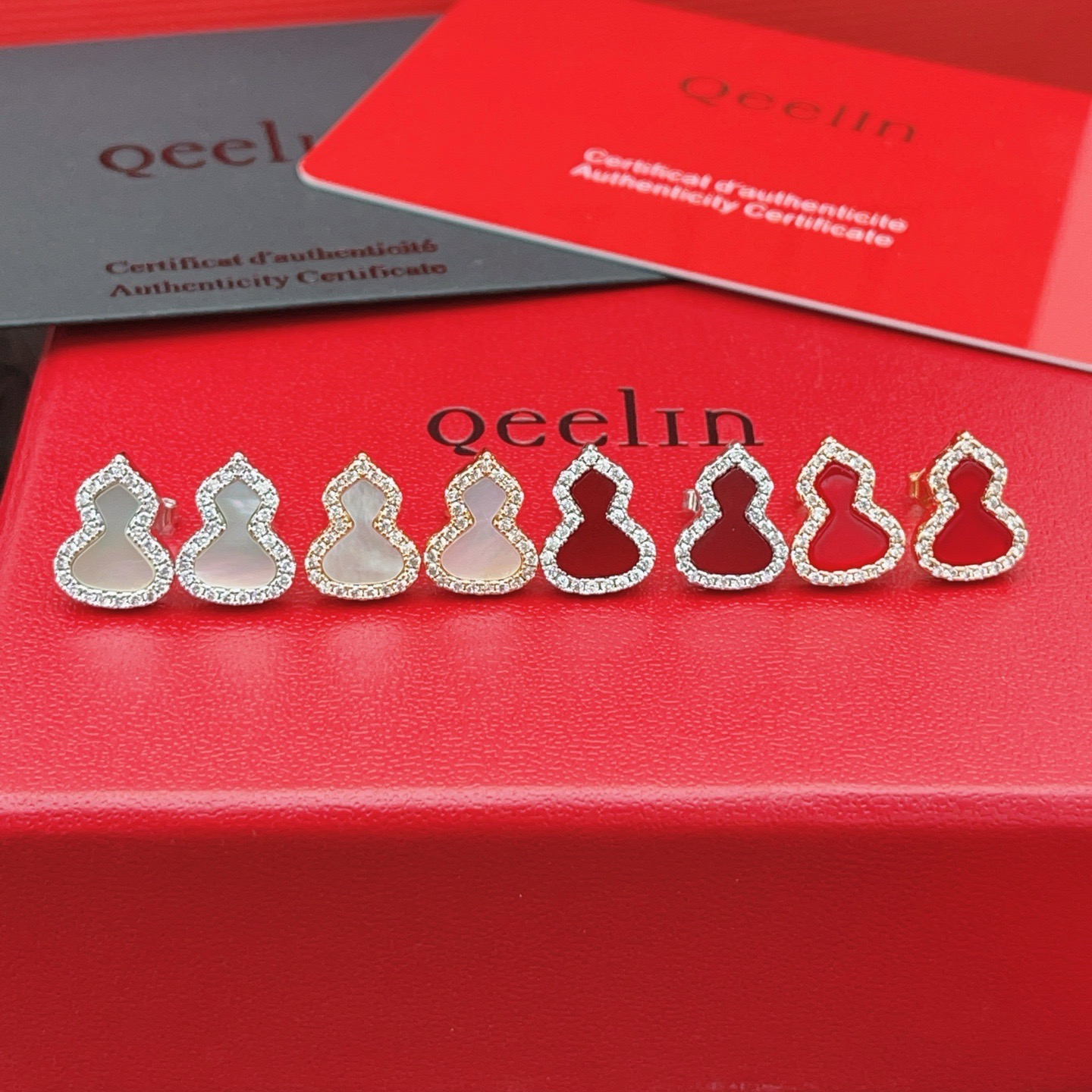 Qeelin Wulu earrings silver-toned white gold white mother-of-pearl clear diamond accents 8mm stud length