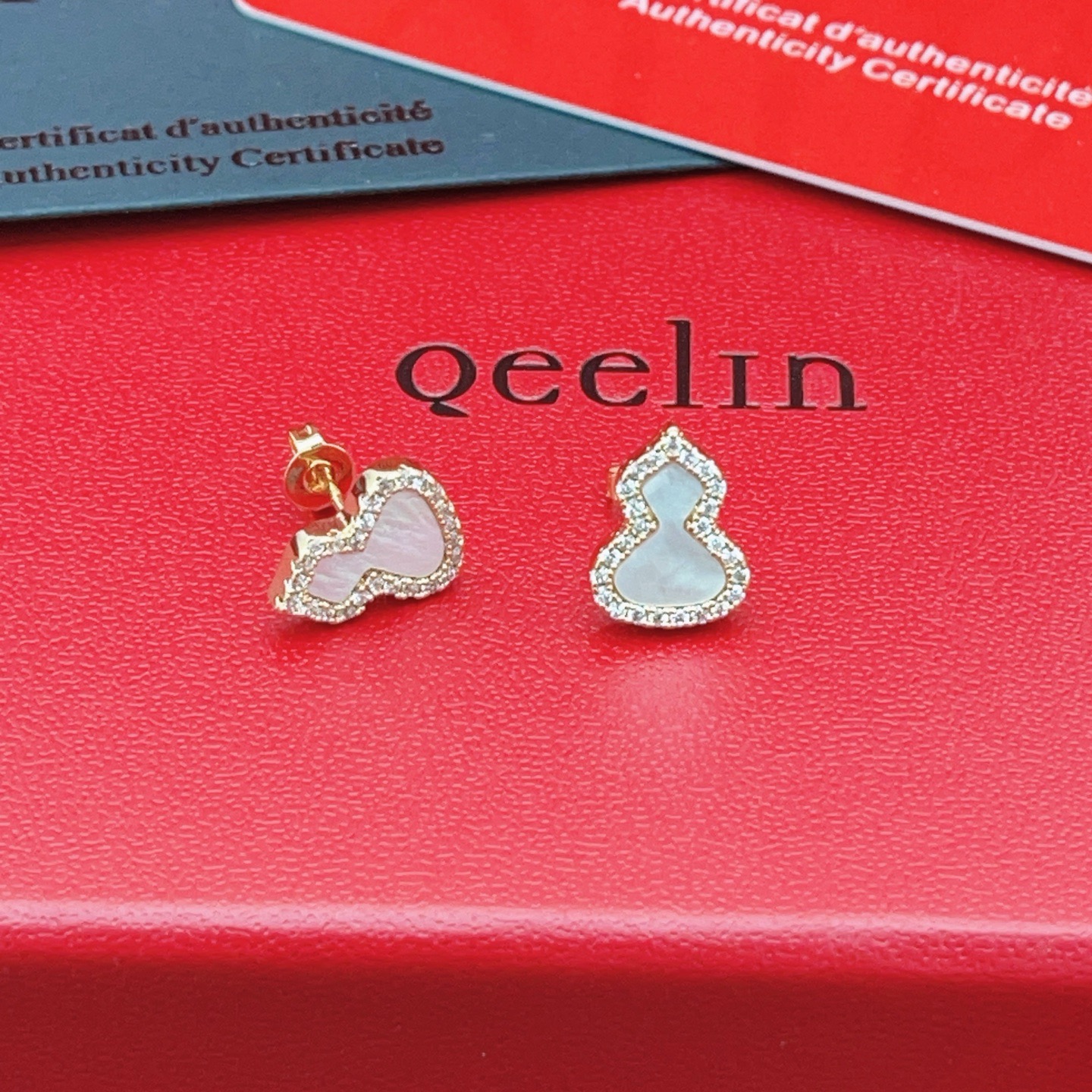 Qeelin Wulu earrings 18k rose gold white mother-of-pearl clear diamond 8mm stud diameter