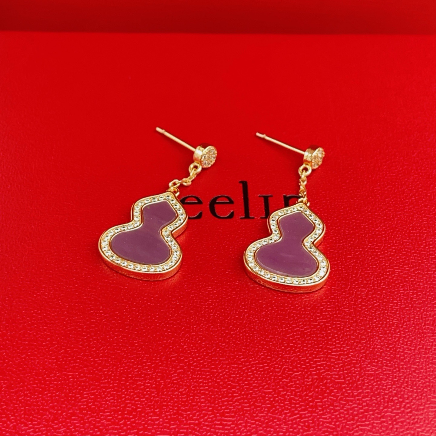 Qeelin Wulu earrings 18K rose gold purple gemstone clear diamond accents 2 2cm drop length
