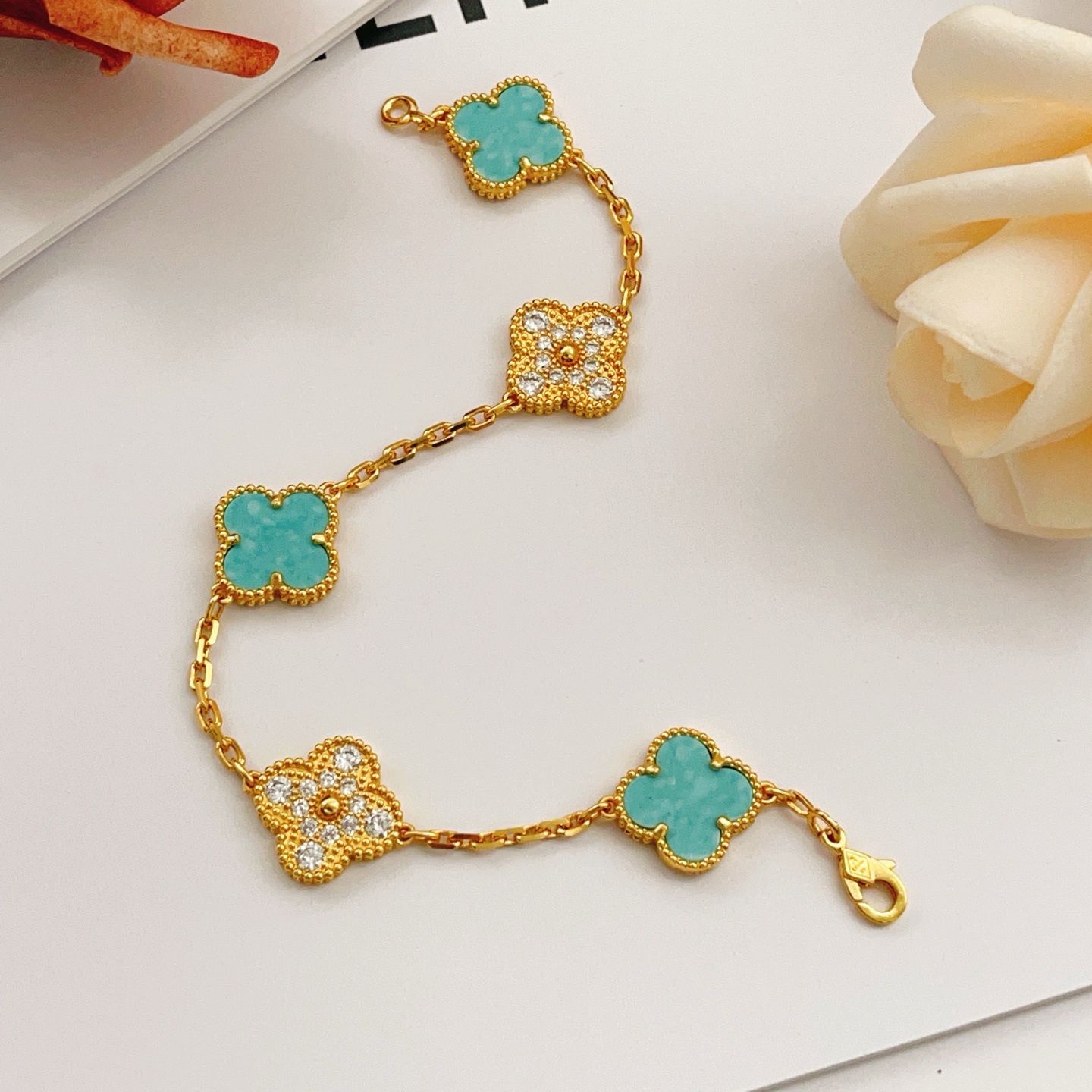 Van Cleef Arpels Vintage Alhambra bracelet Yellow gold with turquoise and diamond accents 18cm