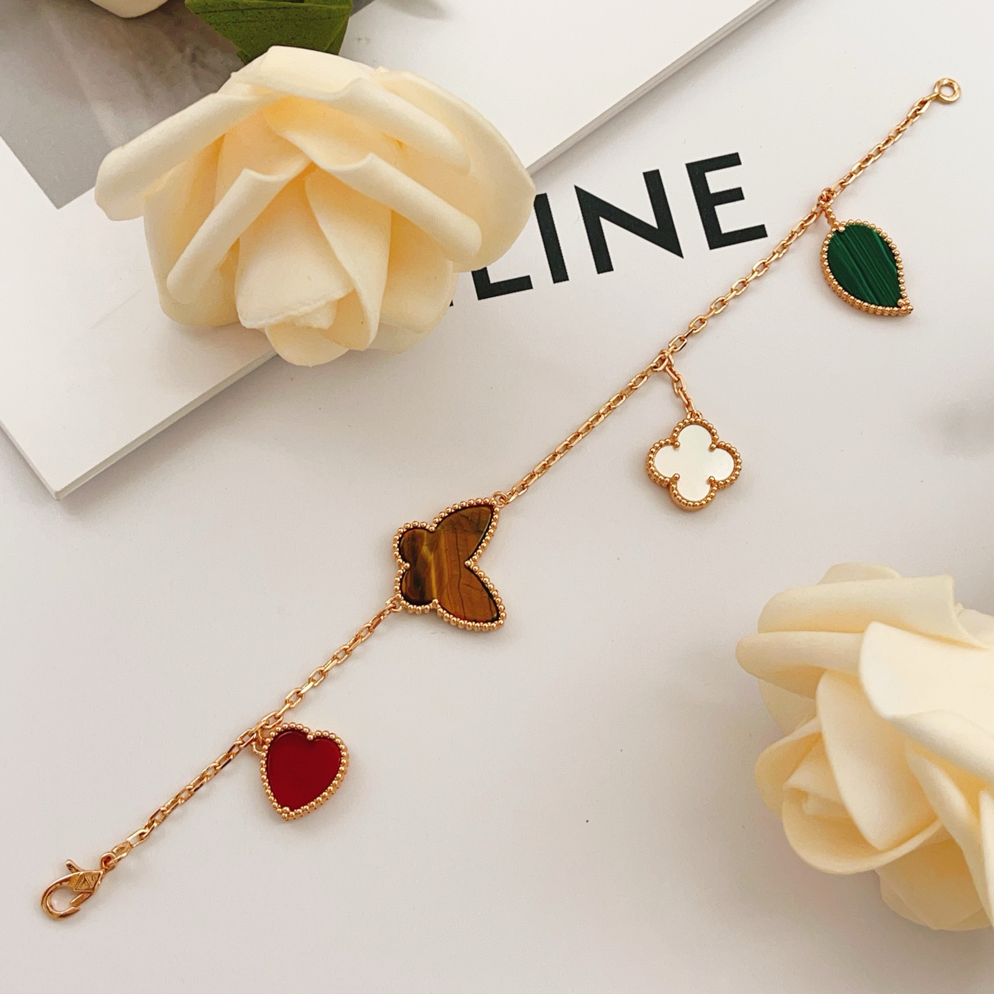 Van Cleef Arpels Lucky Alhambra bracelet Rose gold with red carnelian green malachite brown tiger s eye white mother-of-pearl 19cm