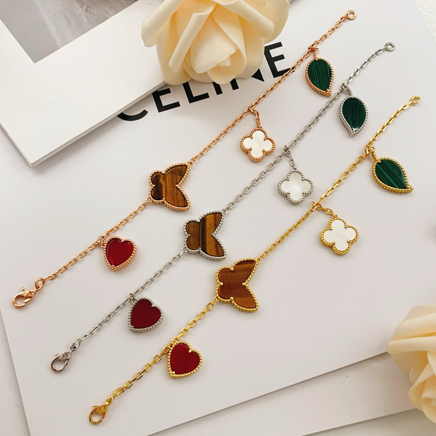 Van Cleef Arpels Bracelet Lucky Alhambra Or jaune avec cornaline rouge vert malachite marron oeil de tigre nacre blanche 19cm