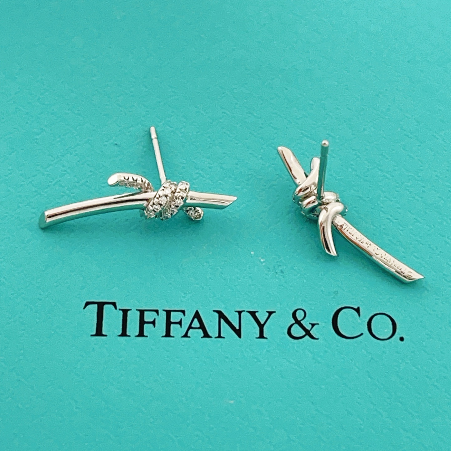 Tiffany Co Knot earrings sterling silver with clear diamond accents 12mm width