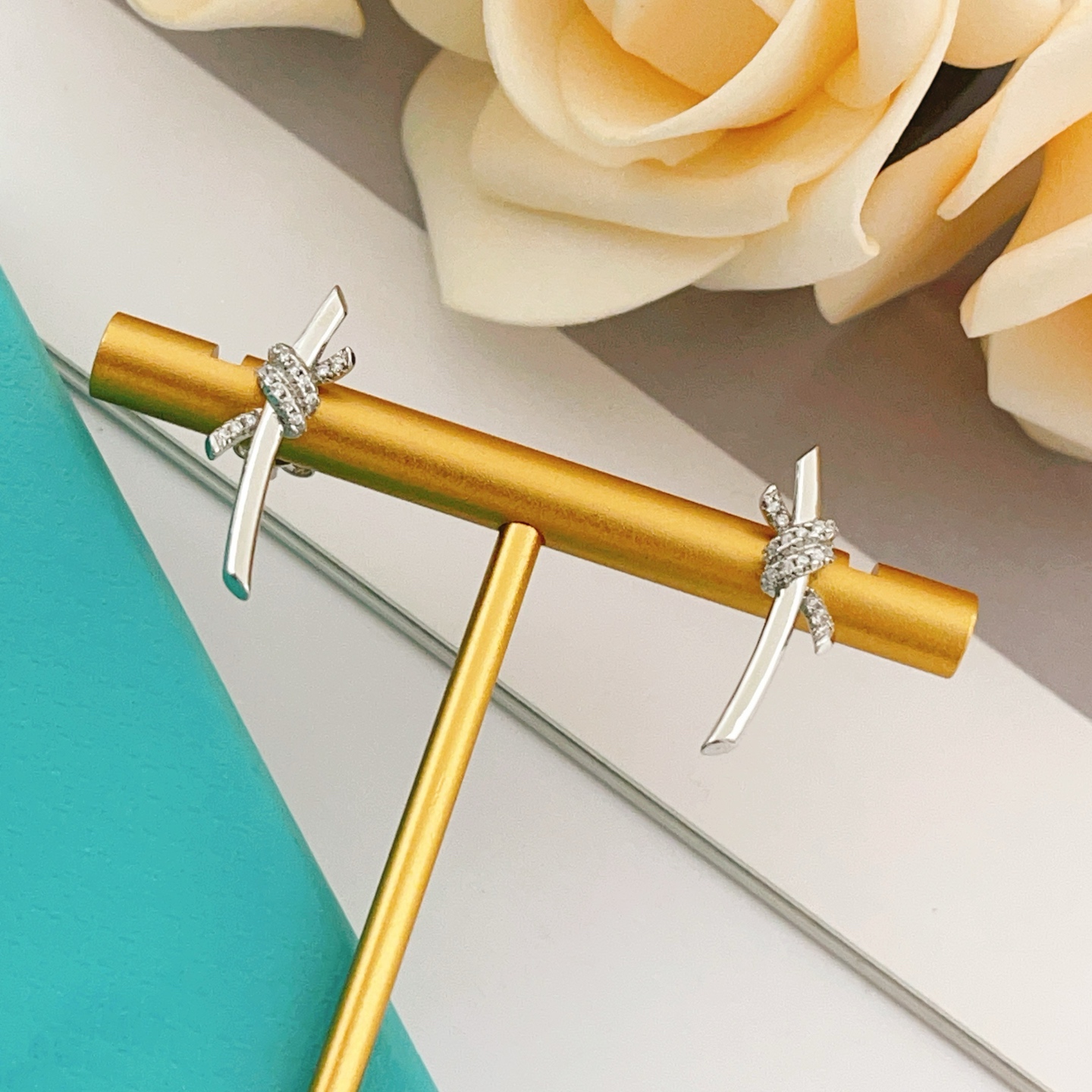 Tiffany Co Knot earrings sterling silver with clear diamond accents 12mm width