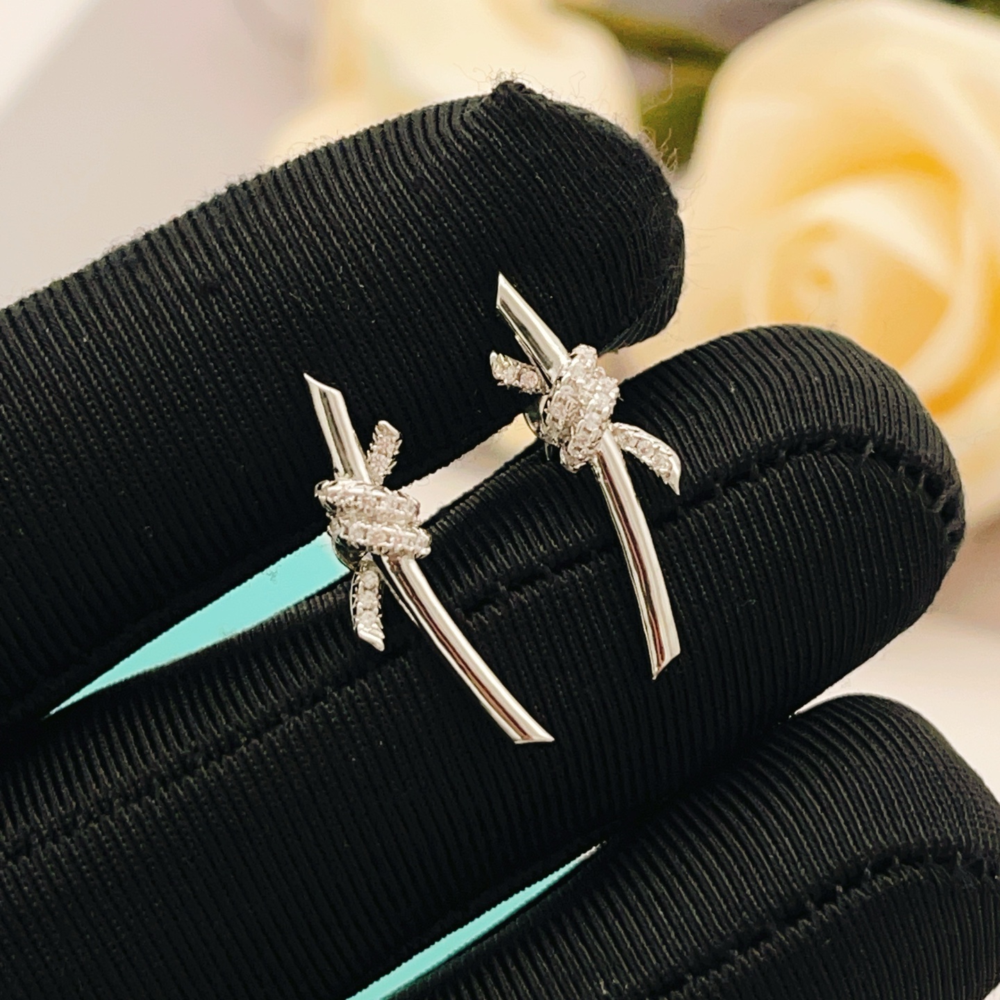 Tiffany Co Knot earrings sterling silver with clear diamond accents 12mm width