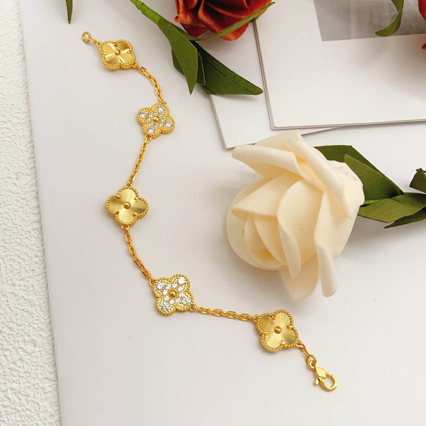 Van Cleef Arpels Vintage Alhambra bracelet Yellow gold with clear diamond accents 19cm
