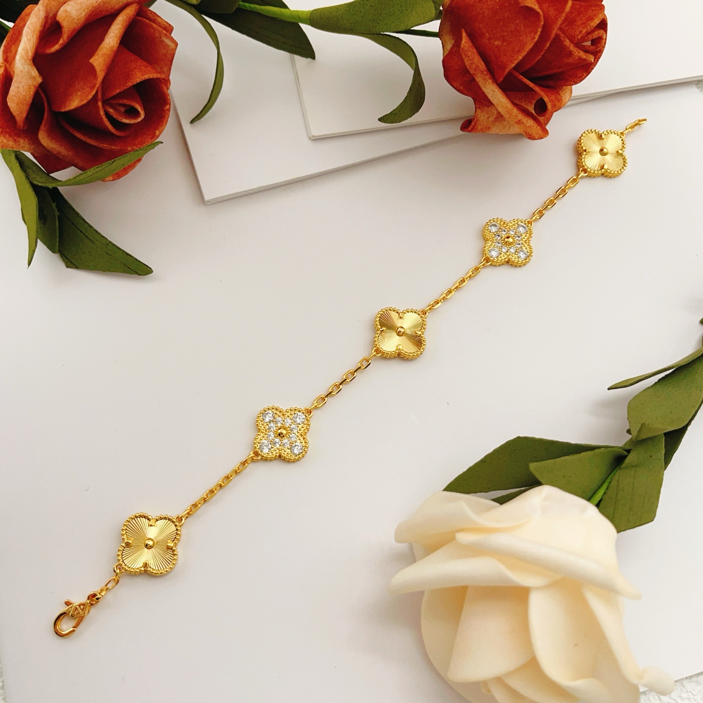 Van Cleef Arpels Vintage Alhambra bracelet Yellow gold with clear diamond accents 19cm