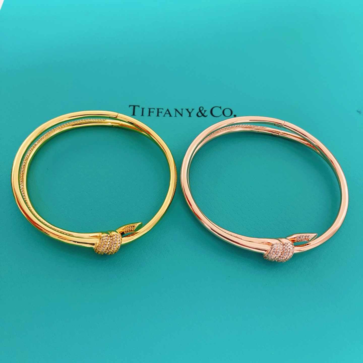 Tiffany Co Knot bracelet rose gold metal with clear pave diamonds 17cm inner circumference