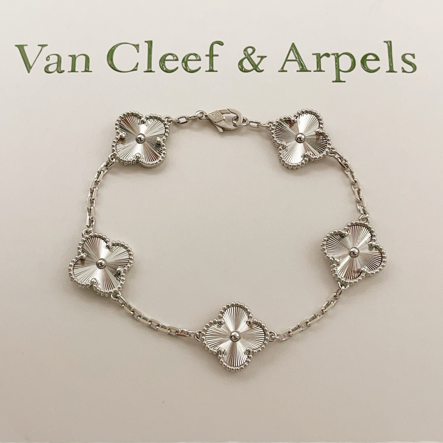 Van Cleef Arpels Vintage Alhambra bracelet silver-toned metal with guilloche engraved clover motifs 18cm
