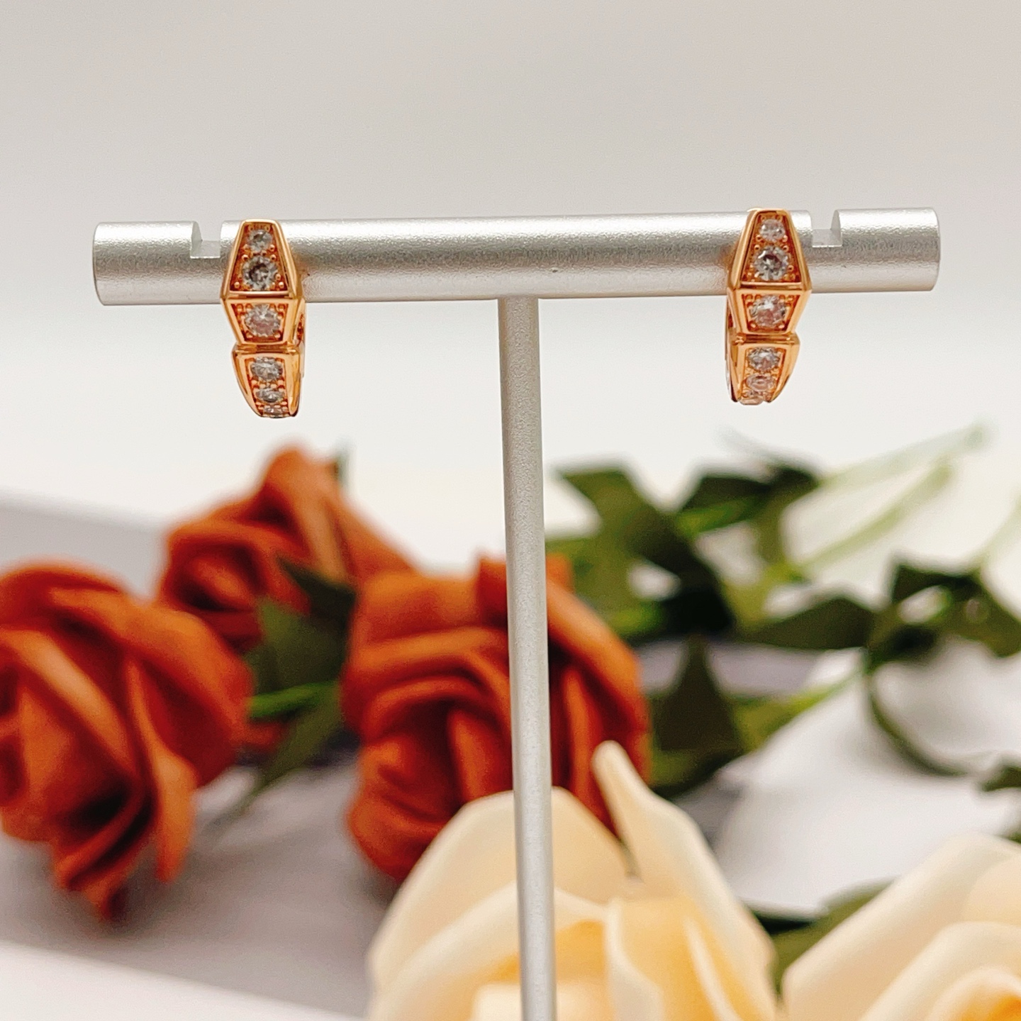 Bvlgari Serpenti Viper earrings rose gold metal with clear diamond-like cubic zirconia stones 15mm hoop diameter