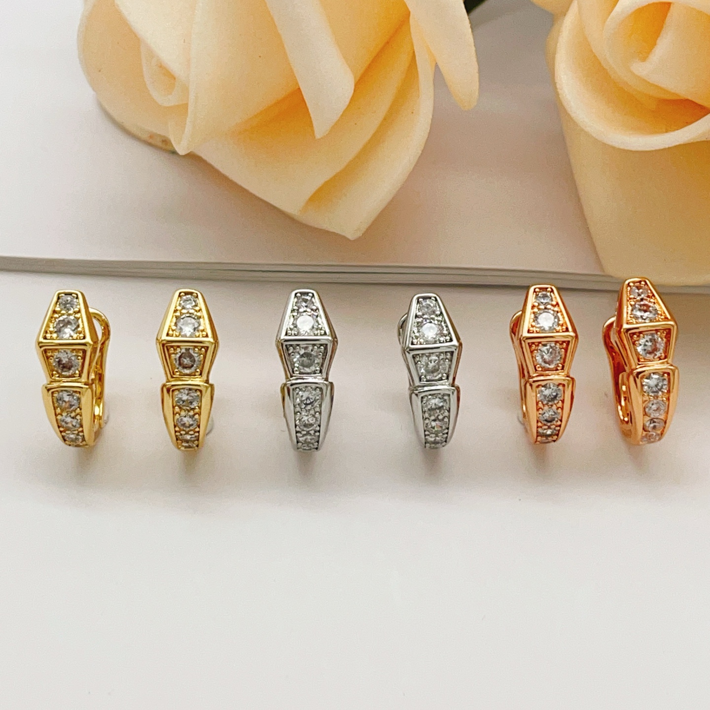 Bvlgari Serpenti Viper earrings rose gold metal with clear diamond-like cubic zirconia stones 15mm hoop diameter