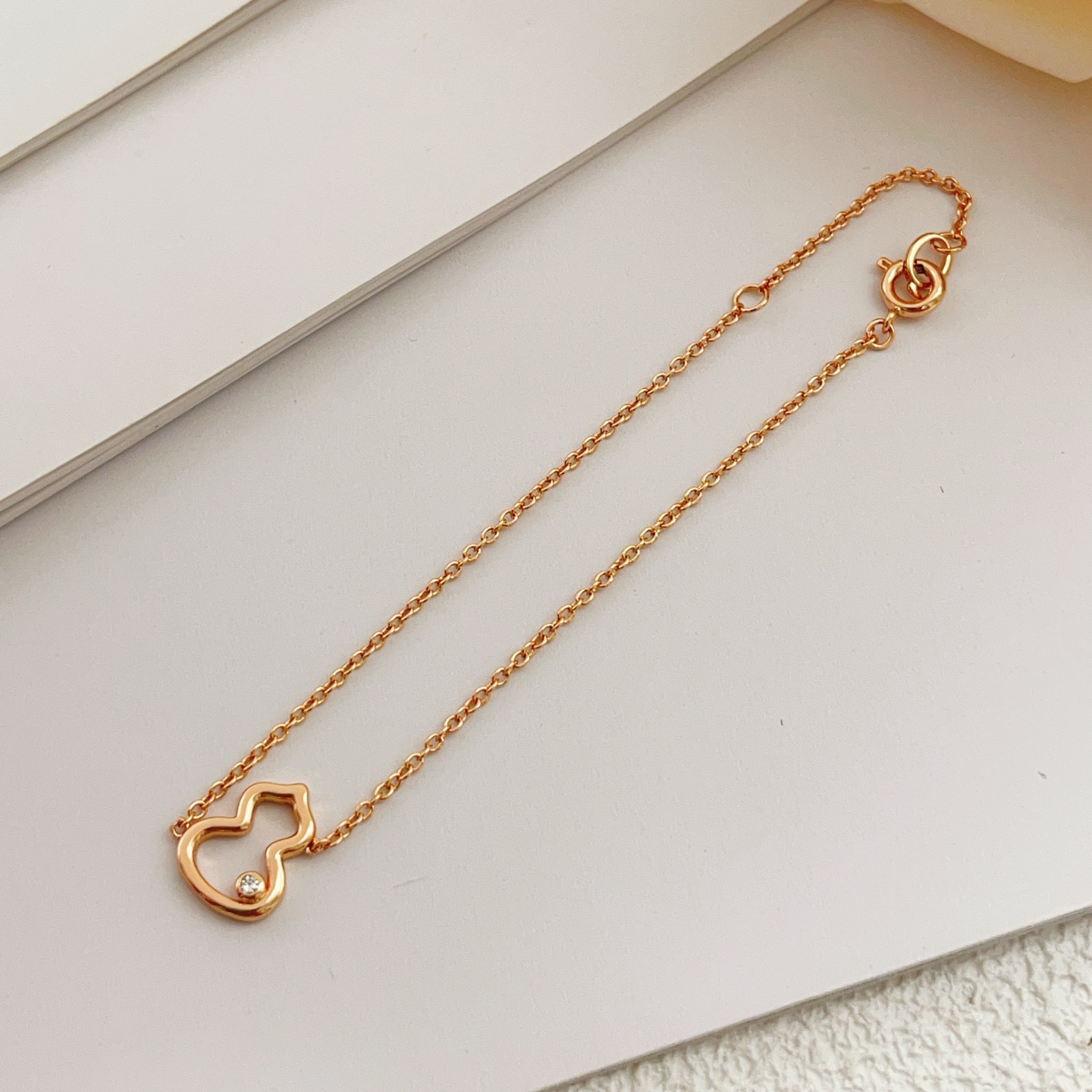 Qeelin Wulu bracelet 18K rose gold with single clear diamond accent 17cm