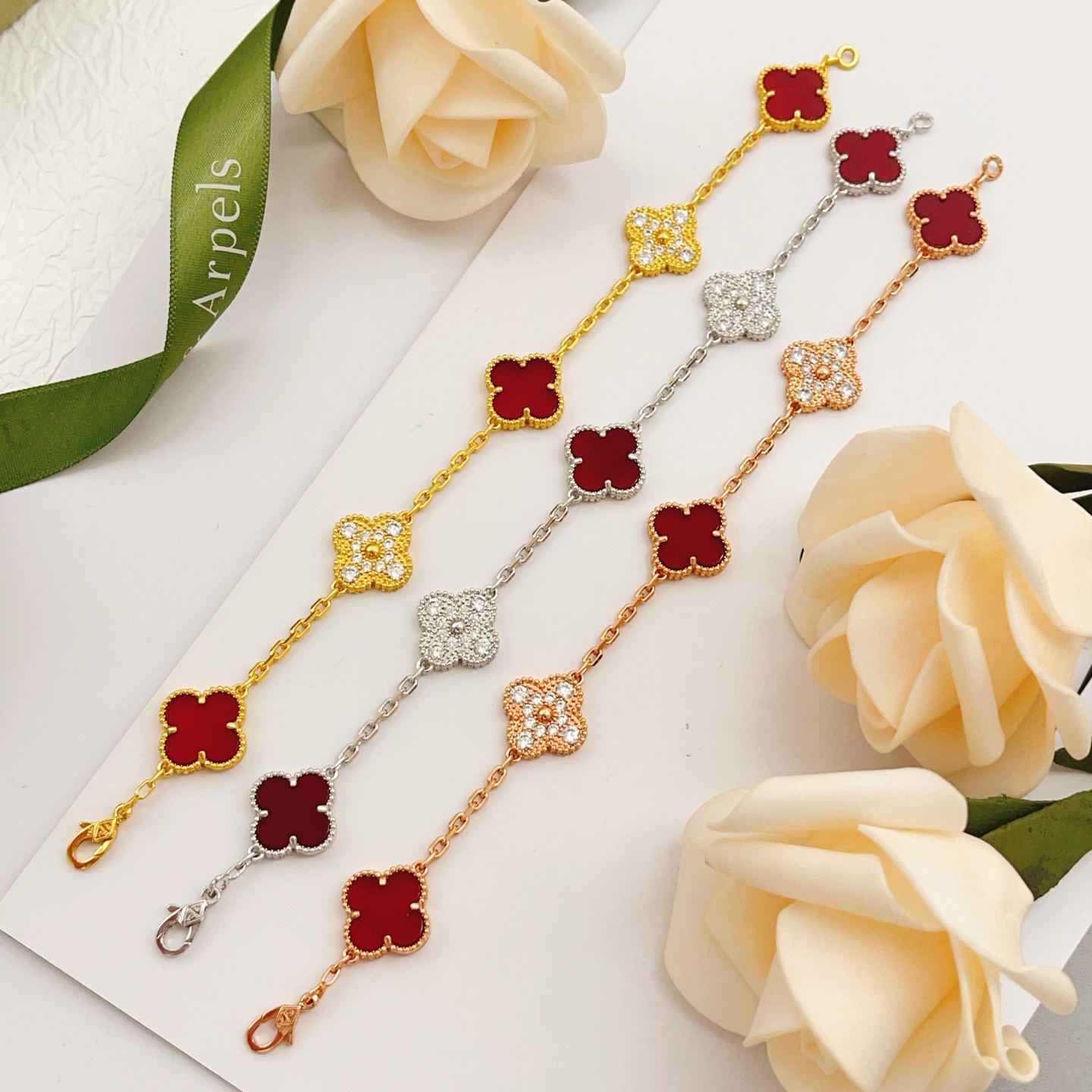 Van Cleef Arpels Vintage Alhambra bracelet Yellow gold with red carnelian and clear diamond accents 18cm