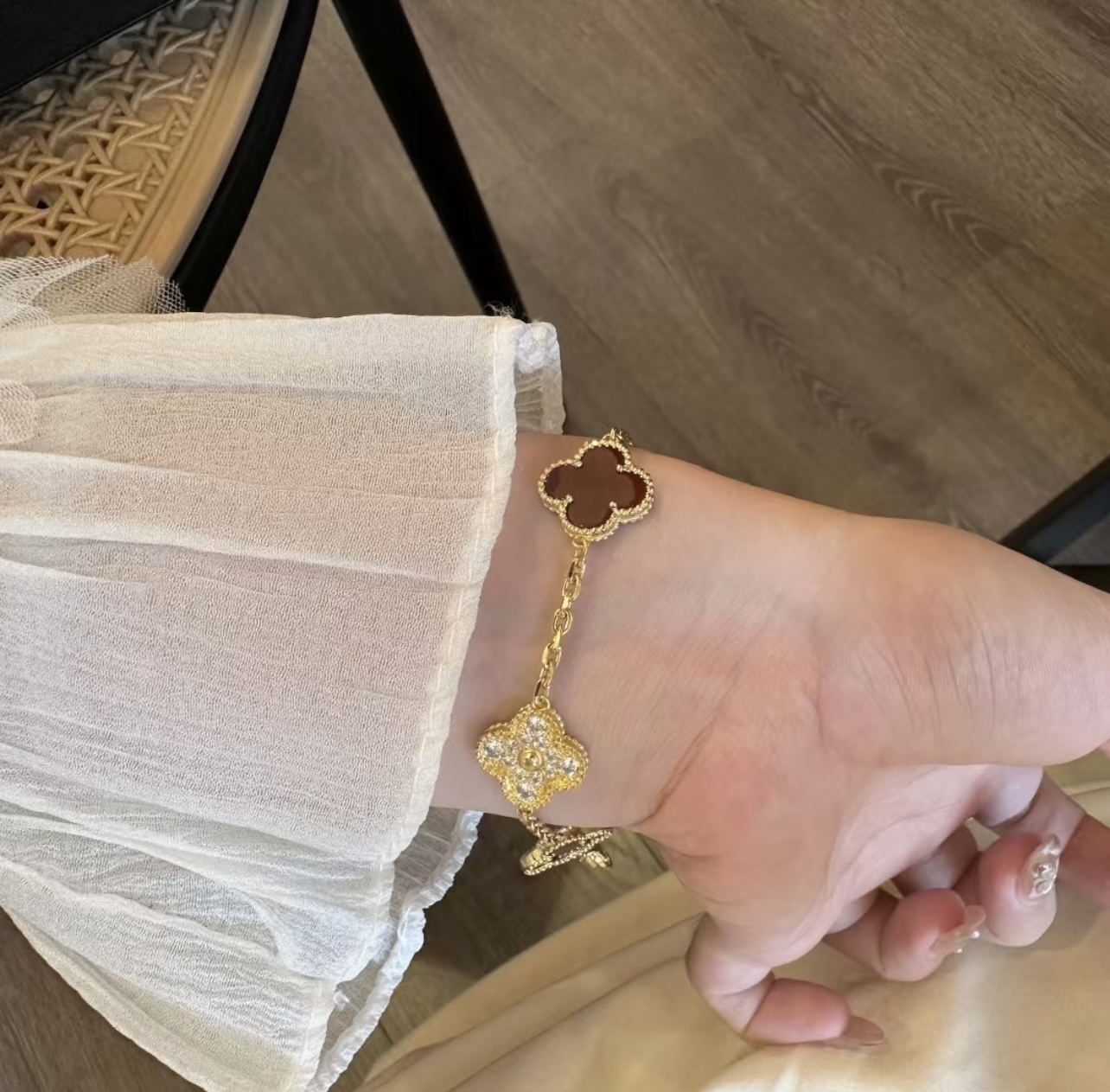 Van Cleef Arpels Vintage Alhambra bracelet Yellow gold with red carnelian and clear diamond accents 18cm
