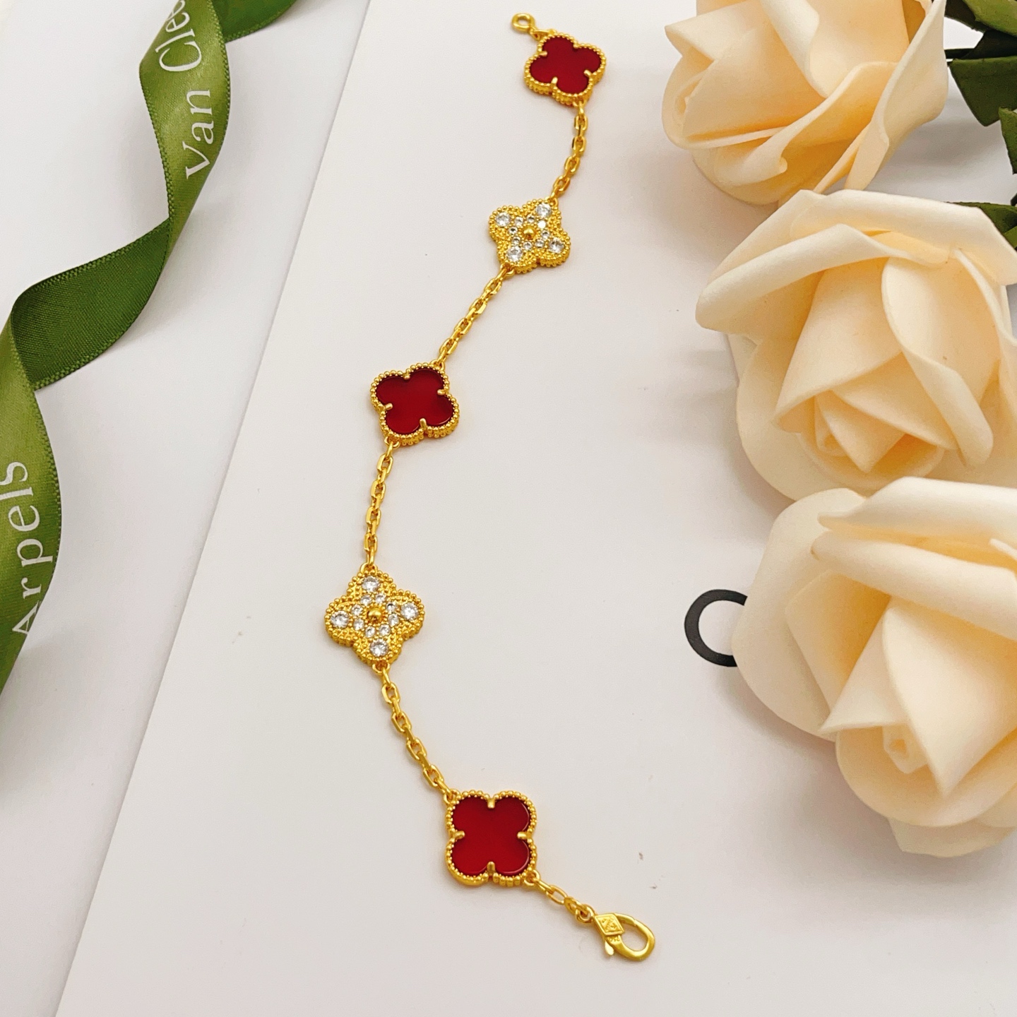 Van Cleef Arpels Vintage Alhambra bracelet Yellow gold with red carnelian and clear diamond accents 18cm