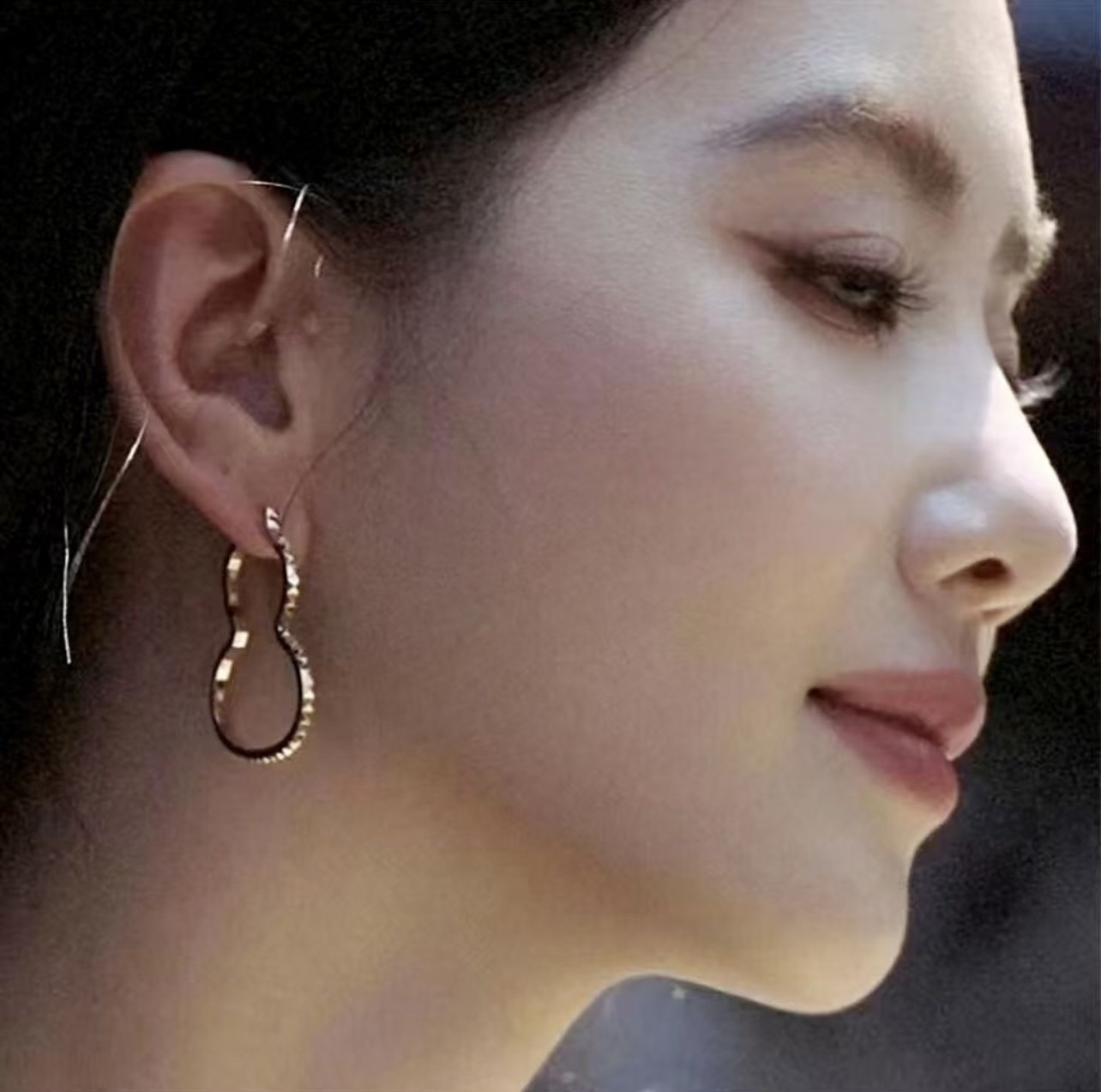 Qeelin Wulu earrings 18k rose gold 18k white gold clear diamond accents 2 5cm hoop diameter