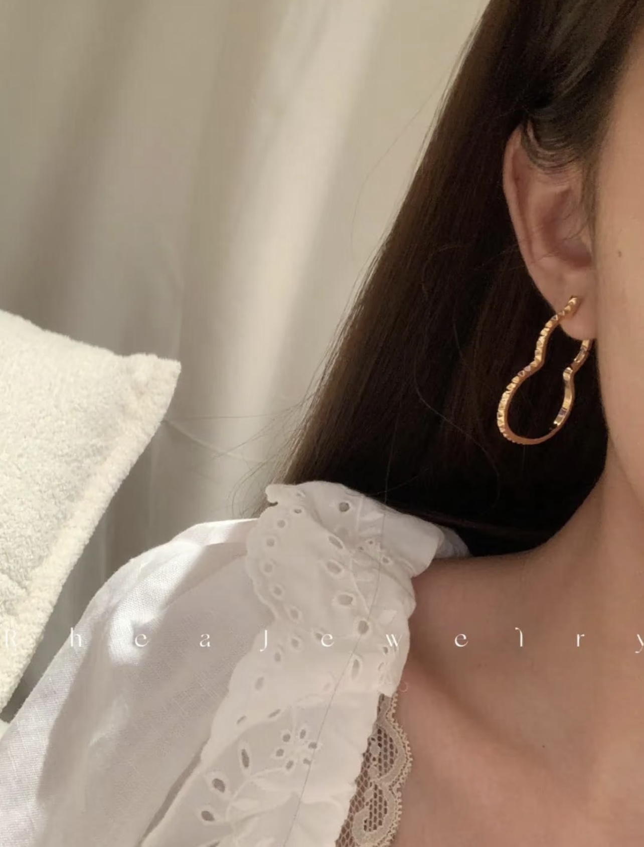 Qeelin Wulu earrings 18k rose gold 18k white gold clear diamond accents 2 5cm hoop diameter