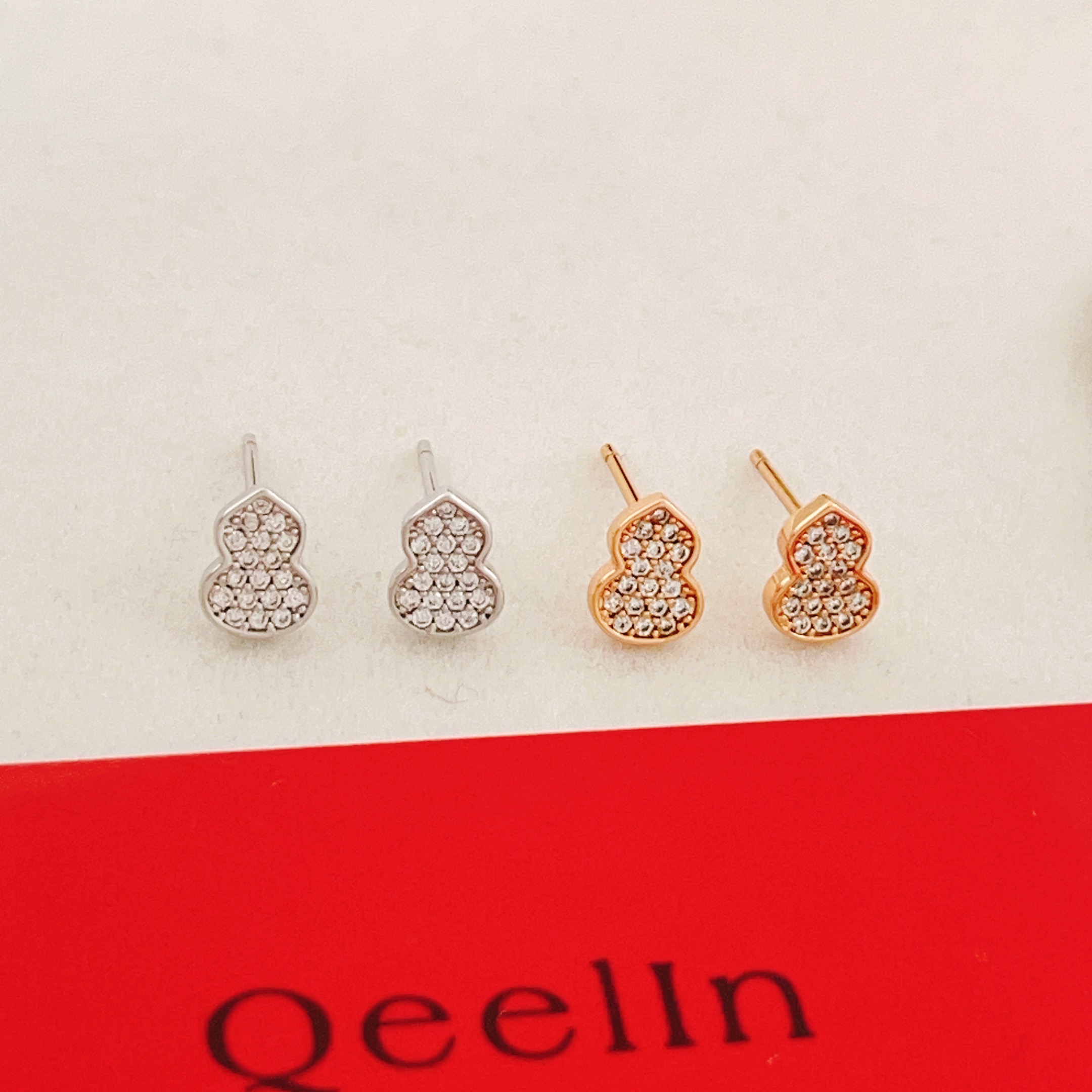 Qeelin Wulu earrings 18K rose gold with pave set clear diamonds 6 5mm stud length