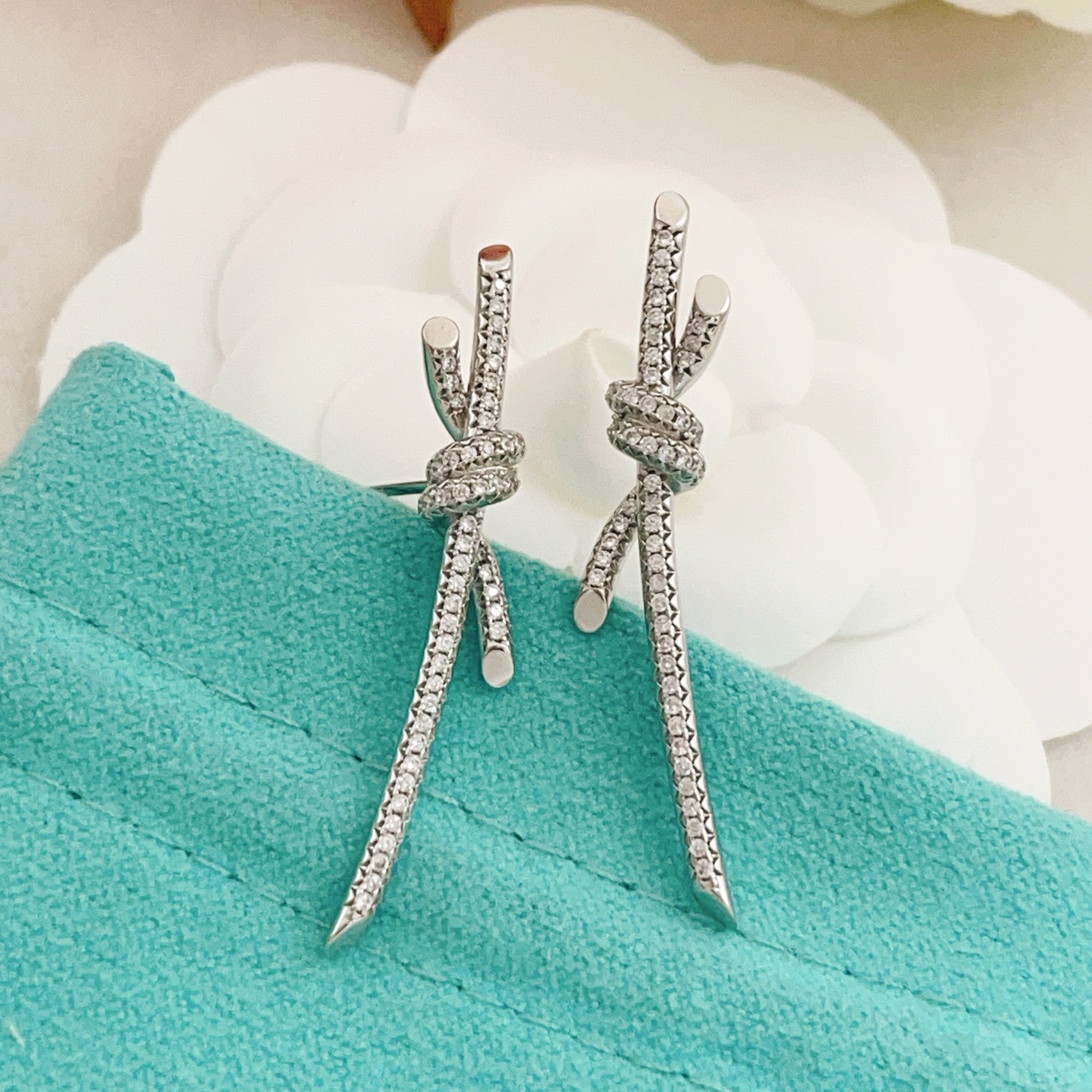 Tiffany Knot earrings silver-toned metal with clear pave diamonds 3 5cm drop length