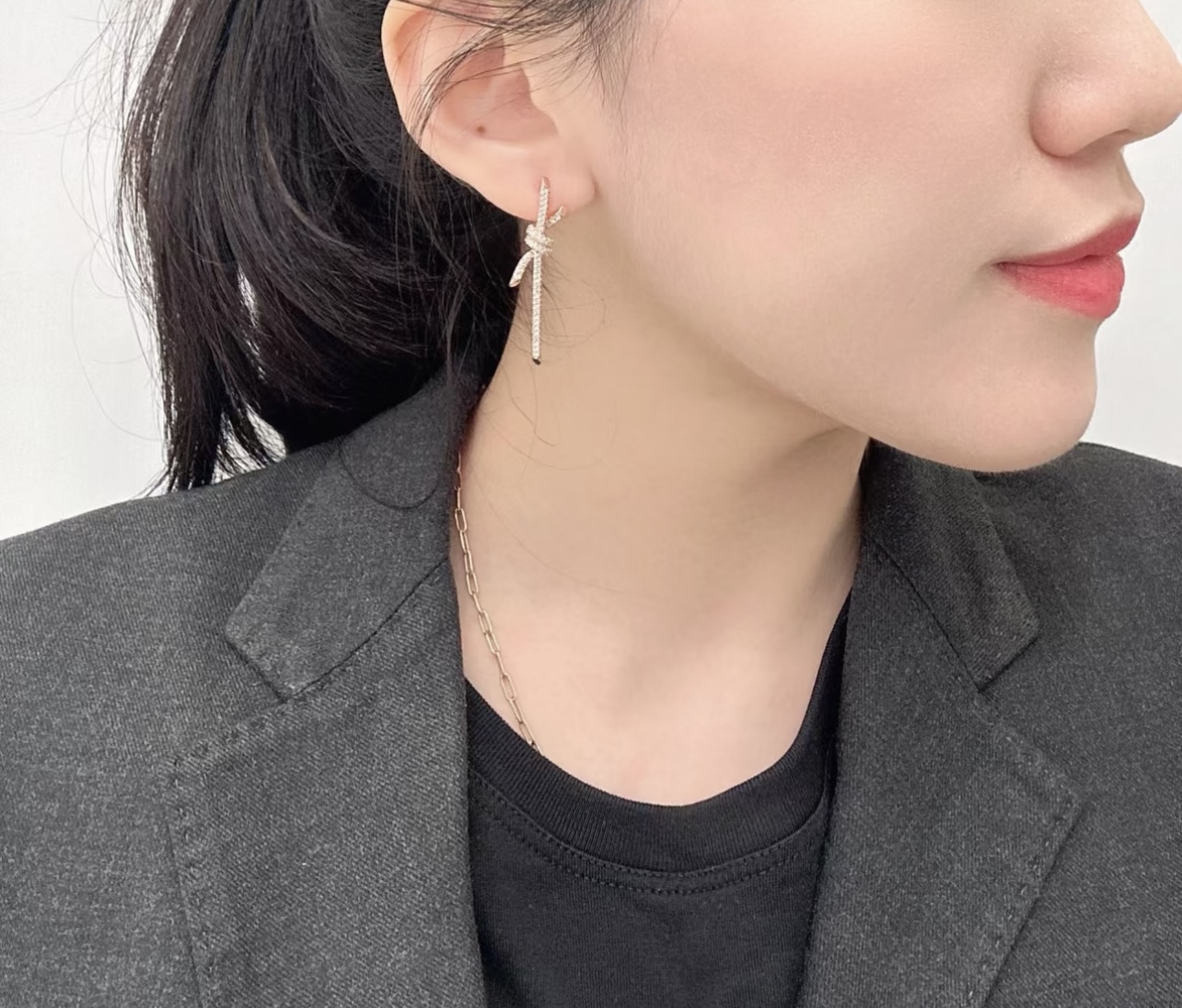 Tiffany Knot earrings silver-toned metal with clear pave diamonds 3 5cm drop length