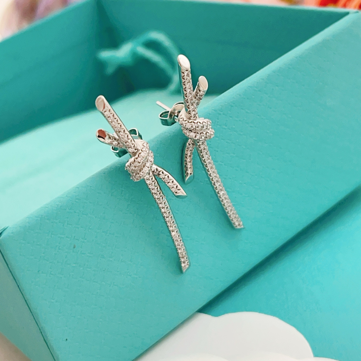 Tiffany Knot earrings silver-toned metal with clear pave diamonds 3 5cm drop length