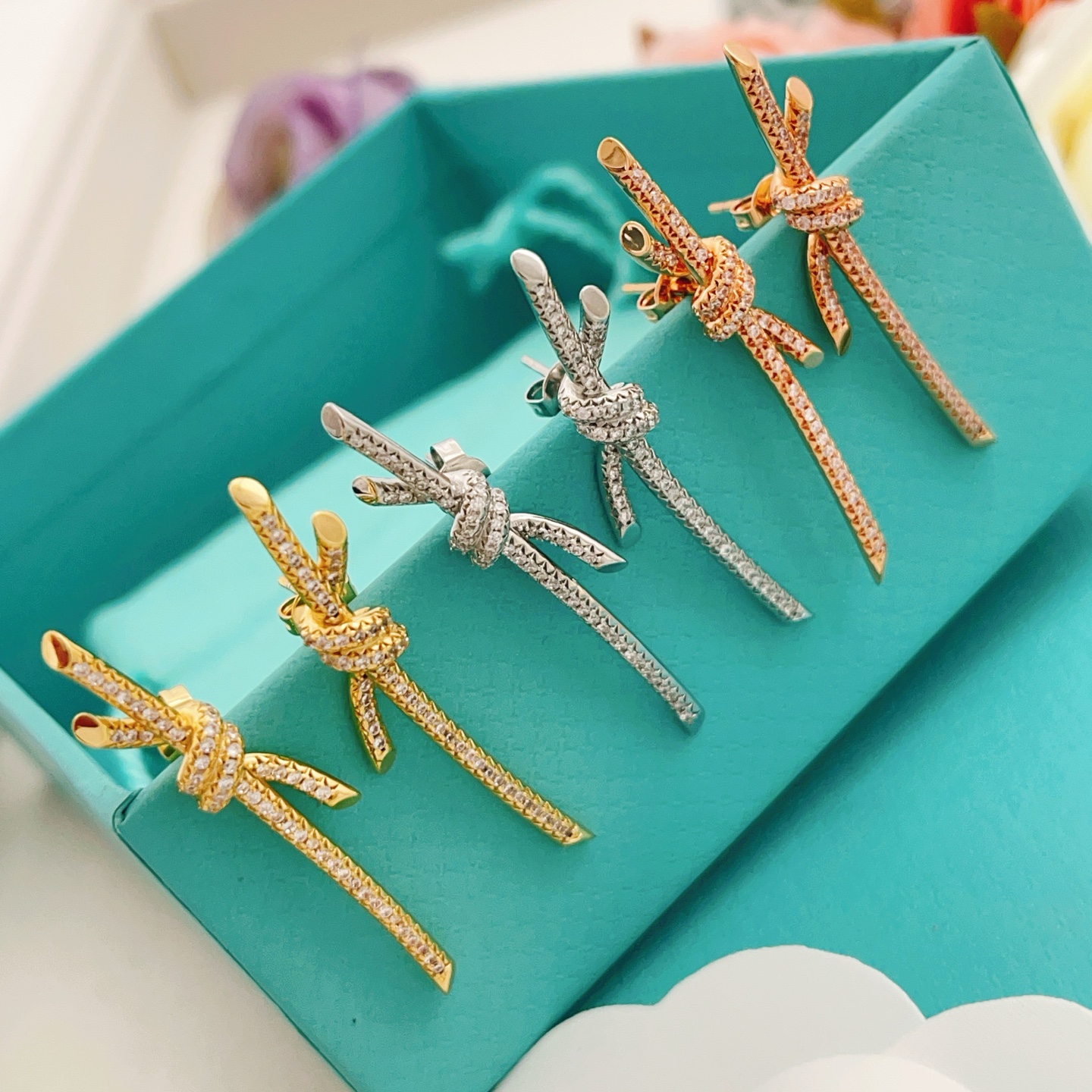 Tiffany Knot earrings silver-toned metal with clear pave diamonds 3 5cm drop length