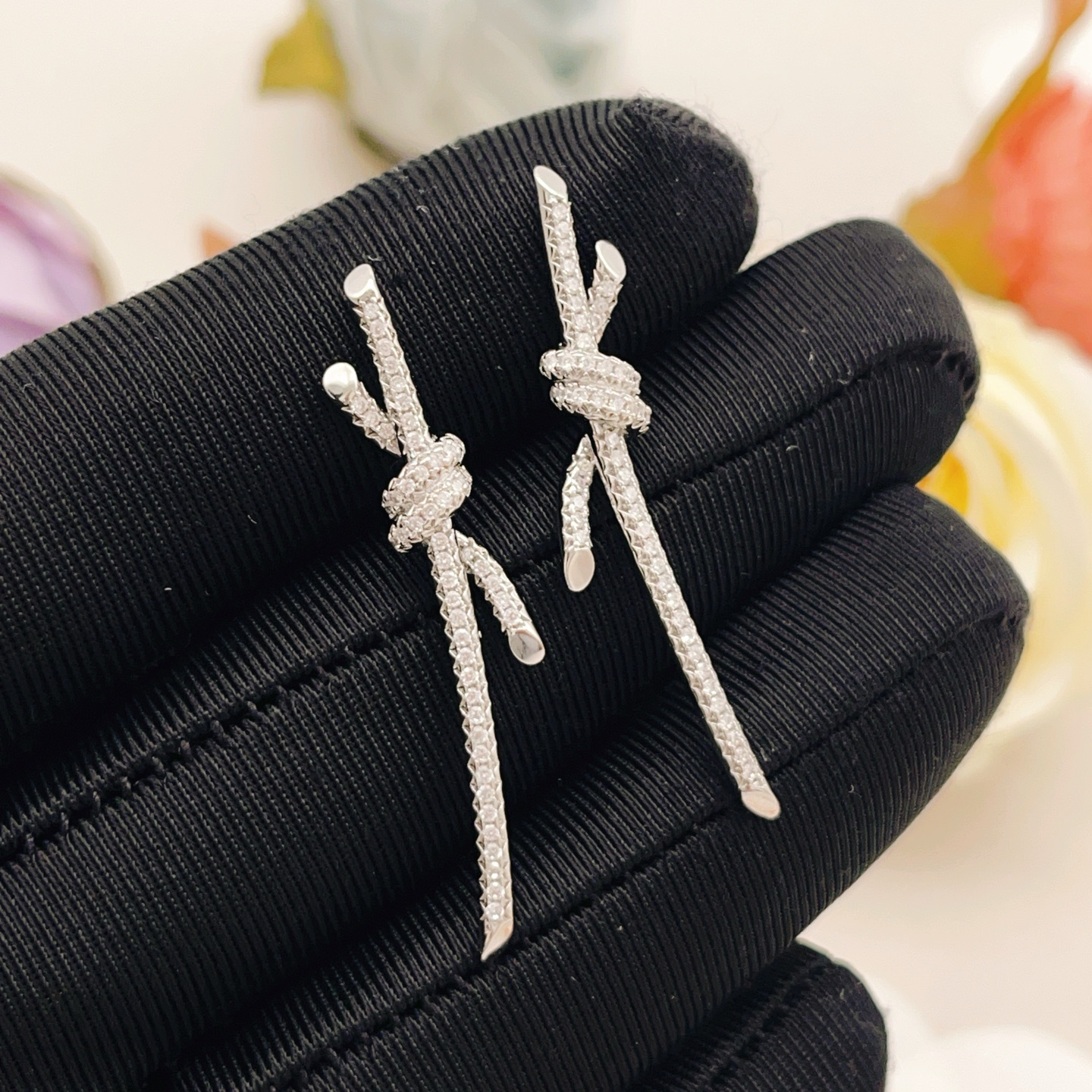 Tiffany Knot earrings silver-toned metal with clear pave diamonds 3 5cm drop length