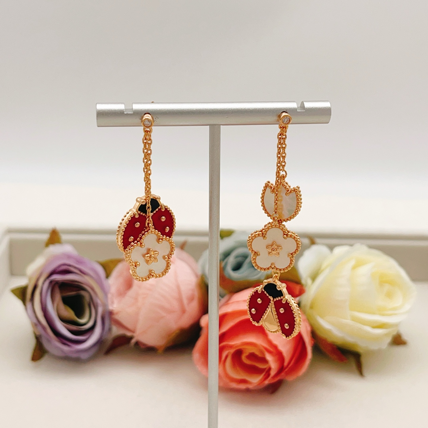 Van Cleef Arpels Lucky Spring earrings Rose gold white mother-of-pearl red carnelian black onyx diamond accent 4 5cm drop length