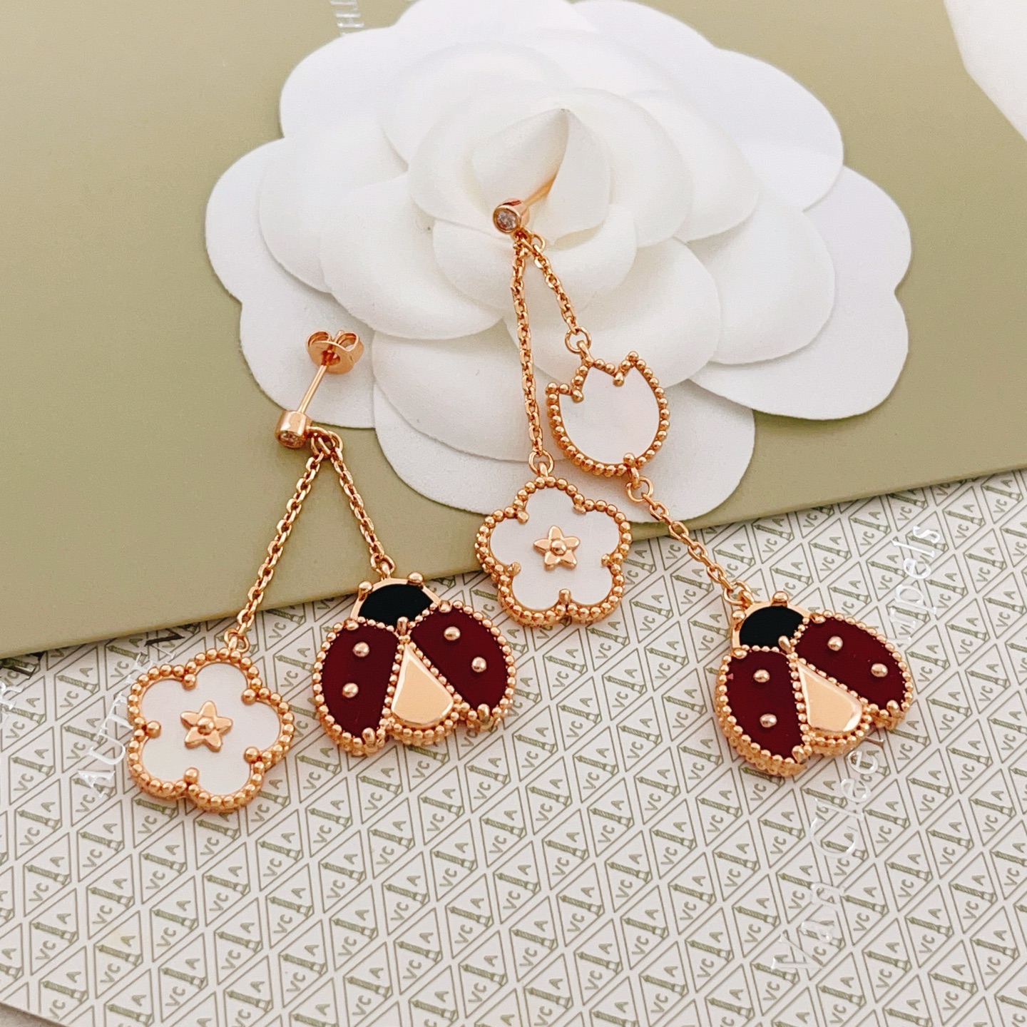 Van Cleef Arpels Lucky Spring earrings Rose gold white mother-of-pearl red carnelian black onyx diamond accent 4 5cm drop length