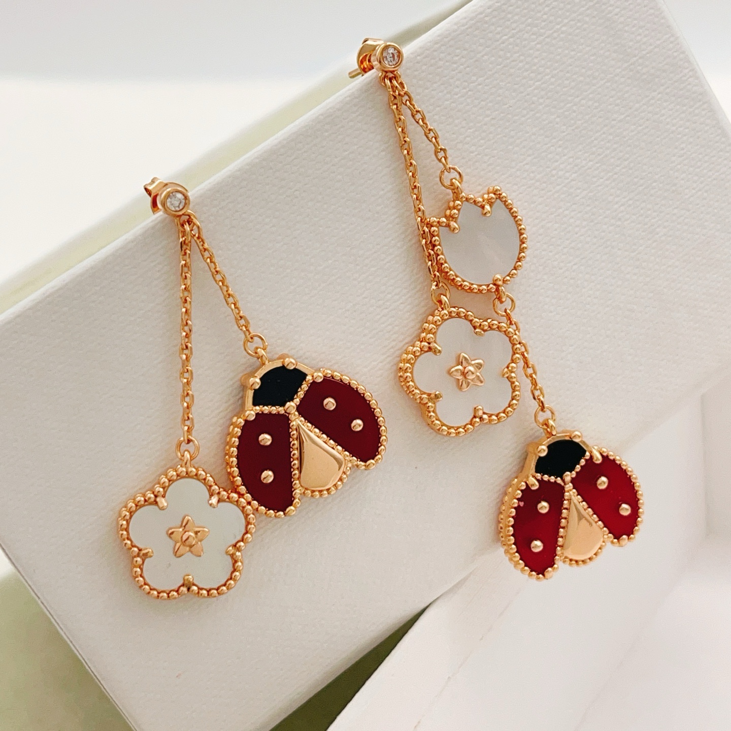 Van Cleef Arpels Lucky Spring earrings Rose gold white mother-of-pearl red carnelian black onyx diamond accent 4 5cm drop length
