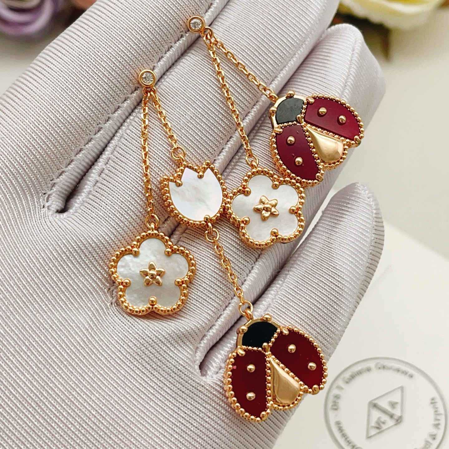 Van Cleef Arpels Lucky Spring earrings Rose gold white mother-of-pearl red carnelian black onyx diamond accent 4 5cm drop length