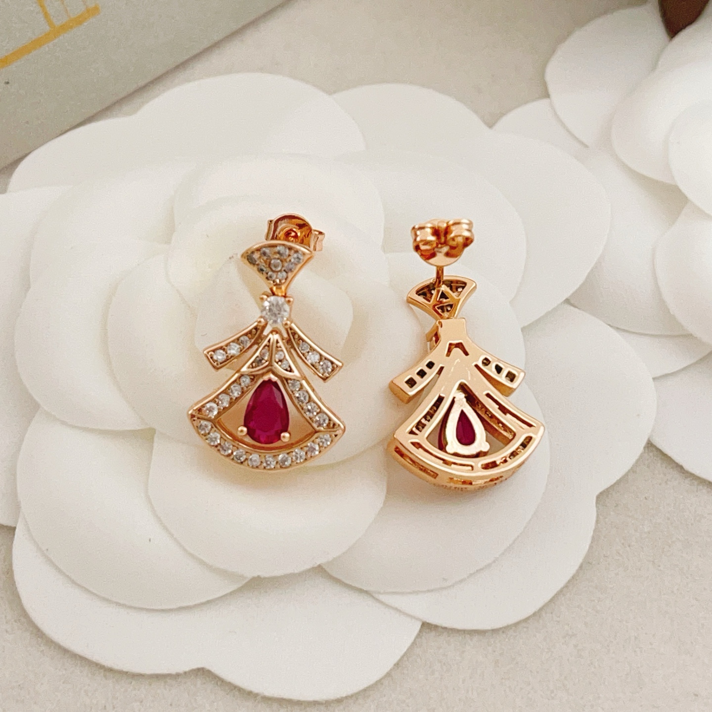 Bvlgari Divas Dream earrings Rose gold with clear pave diamonds and pear-shaped ruby red gemstones 1 8cm drop length
