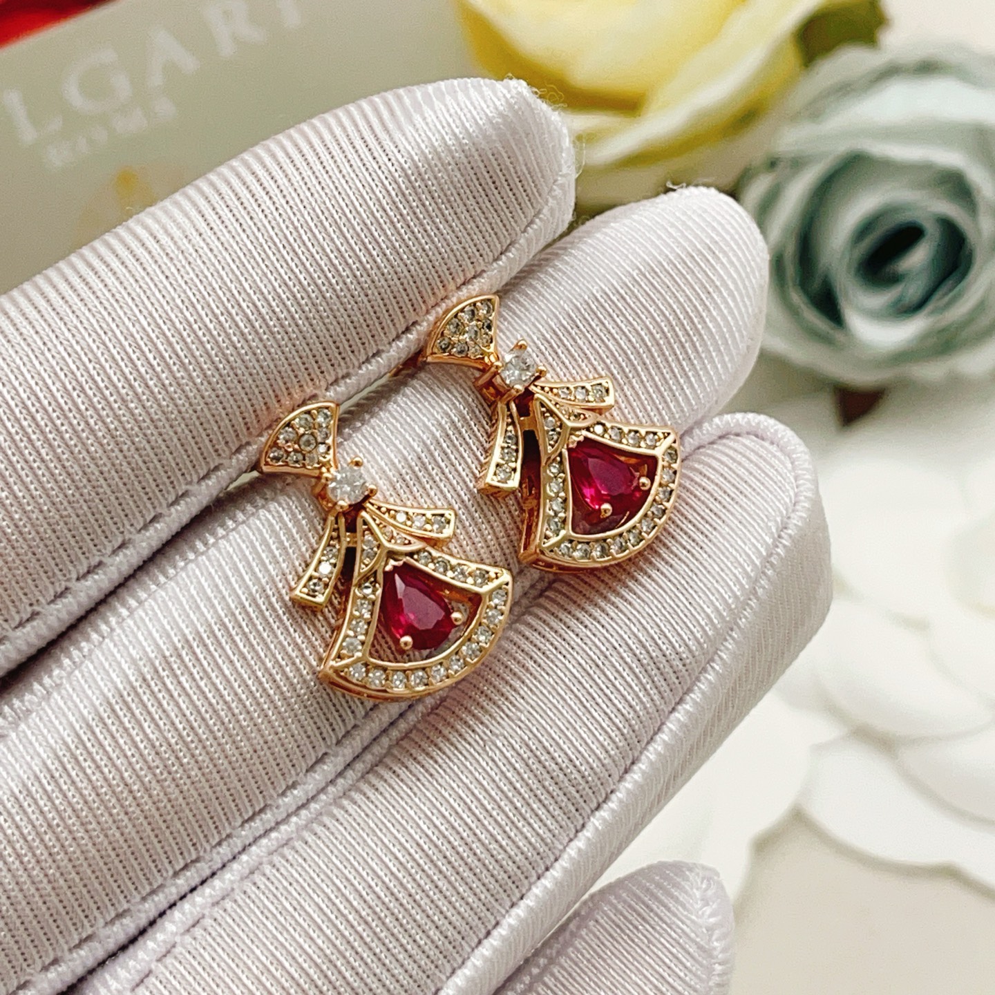 Bvlgari Divas Dream earrings Rose gold with clear pave diamonds and pear-shaped ruby red gemstones 1 8cm drop length