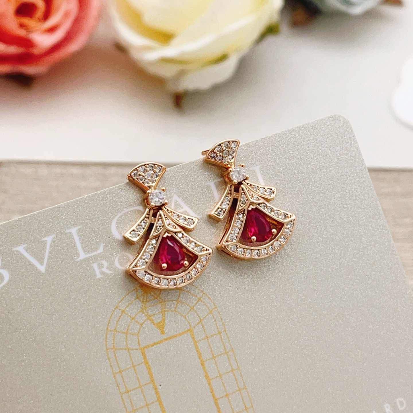 Bvlgari Divas Dream earrings Rose gold with clear pave diamonds and pear-shaped ruby red gemstones 1 8cm drop length