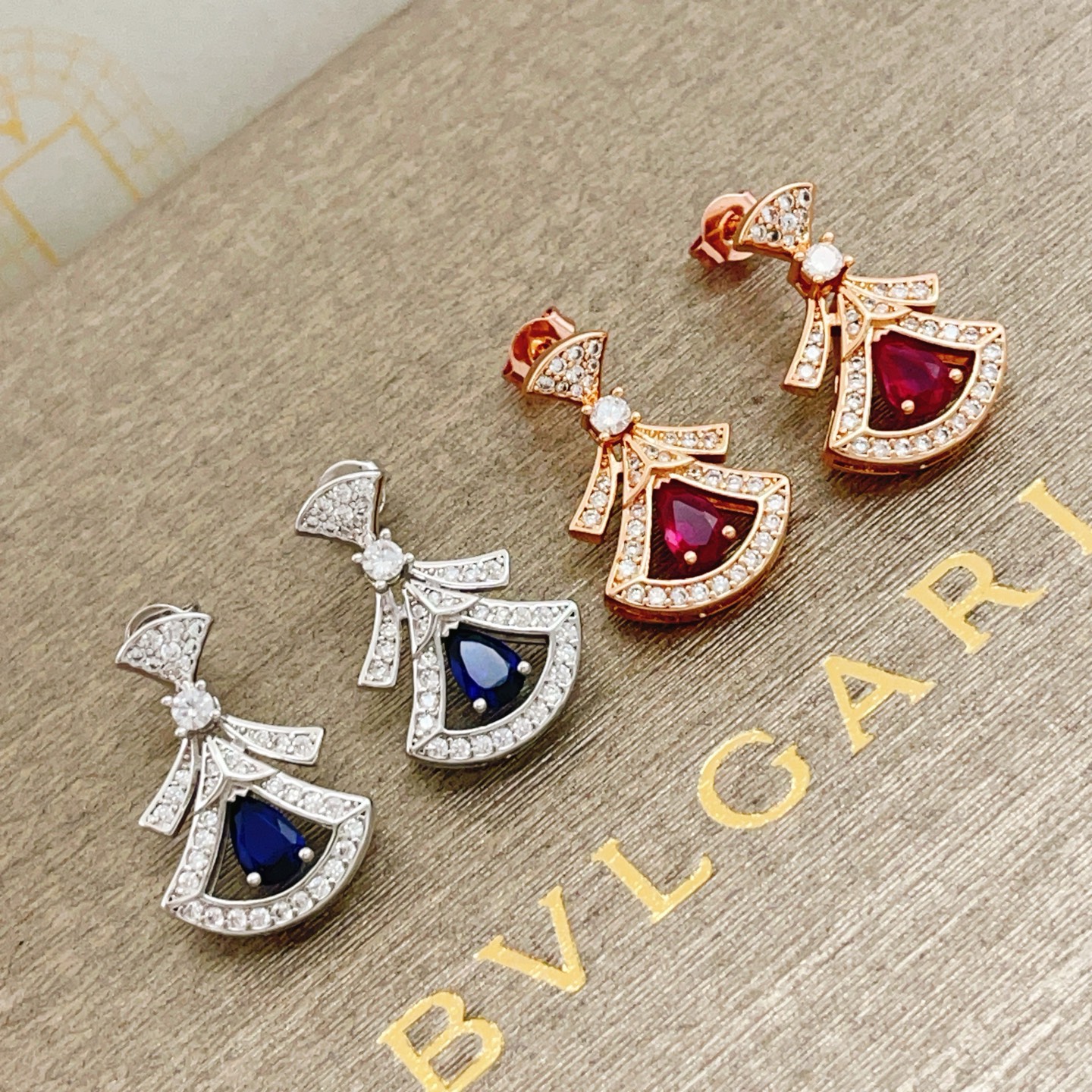 Bvlgari Divas Dream earrings Rose gold with clear pave diamonds and pear-shaped ruby red gemstones 1 8cm drop length