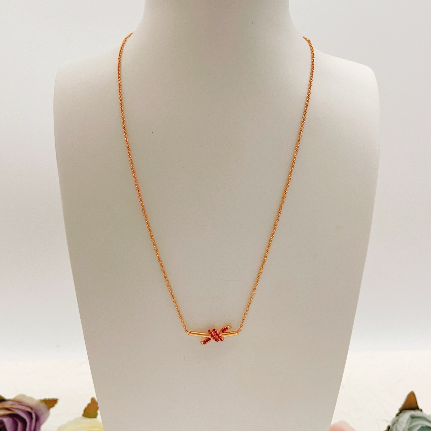 Tiffany Co Knot necklace 18k rose gold with ruby accents 45cm