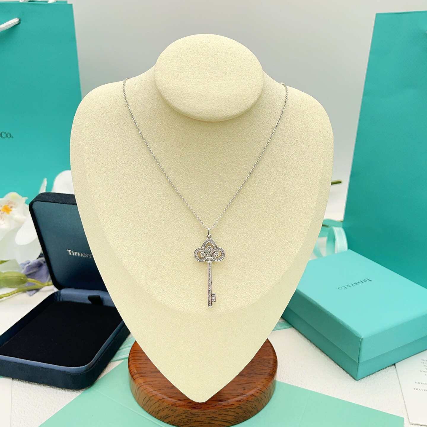 Tiffany Co Tiffany Keys Fleur de Lis Key Pendant necklace 18k white gold with diamond accents 18 inches